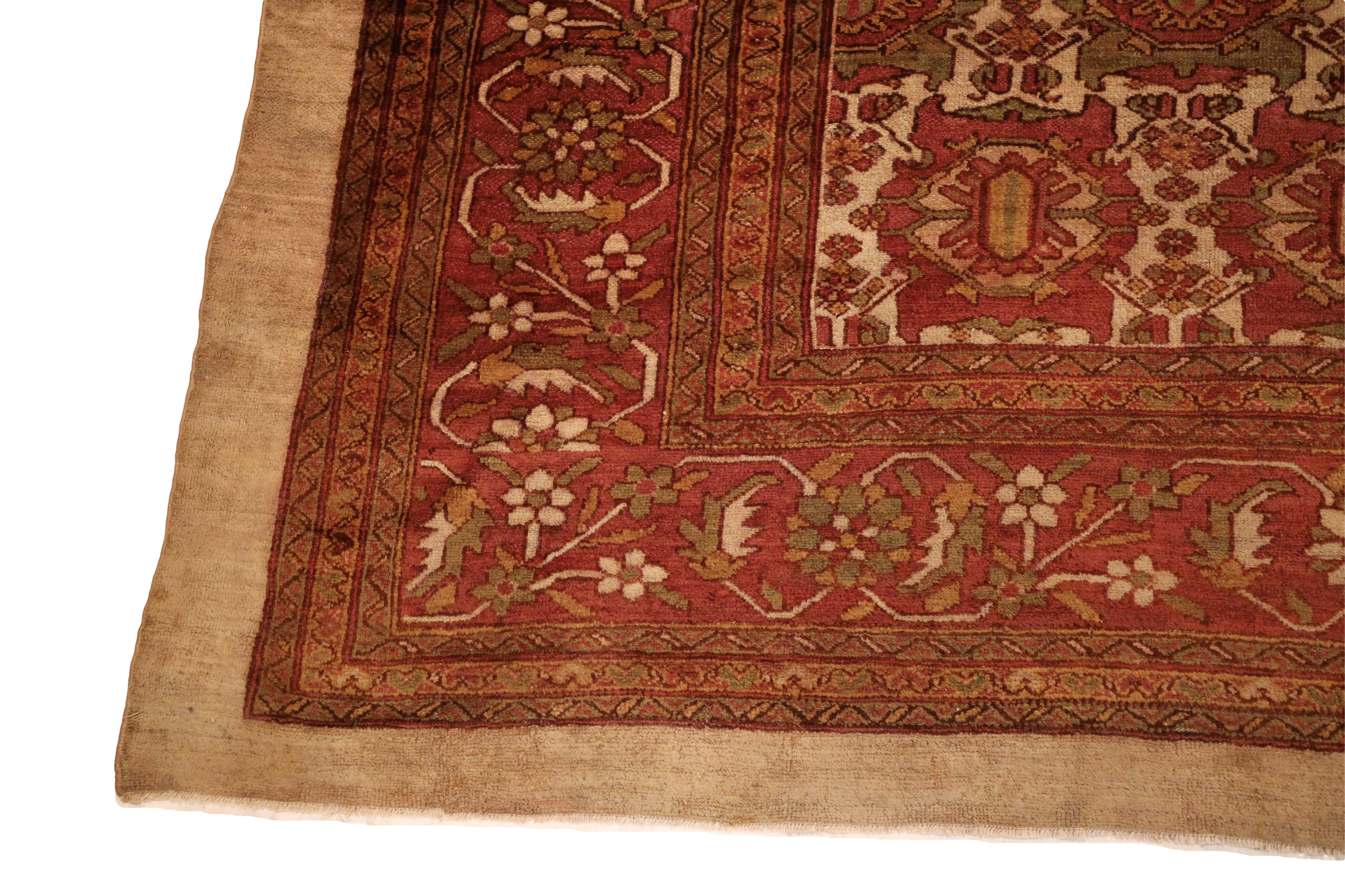Indulge in the timeless allure of this exquisite Antique Large Size Gallery Malayer Rug, a testament to the enduring beauty of Persian craftsmanship. This masterfully handwoven piece boasts a resplendent ivory background that serves as a canvas for