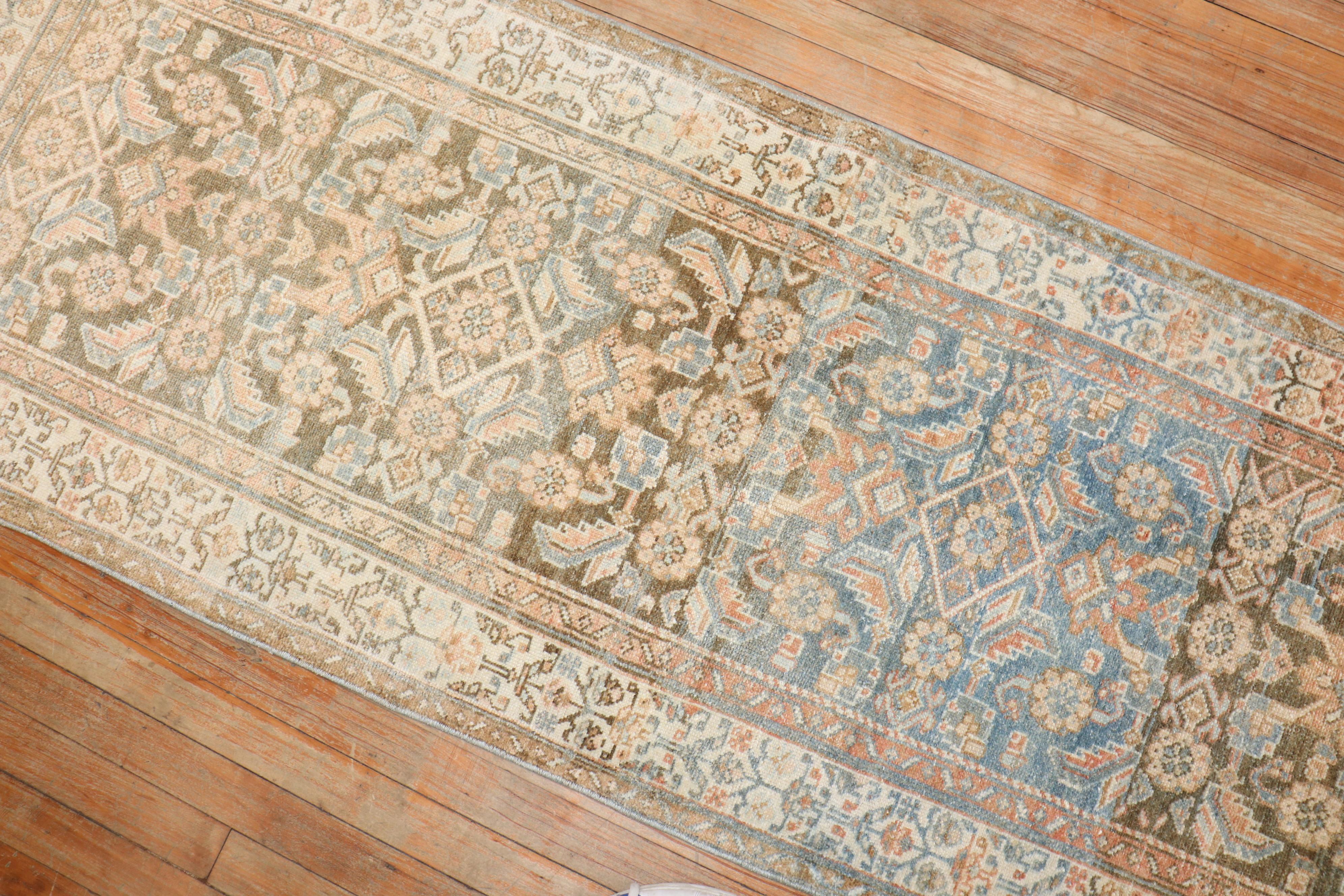Early 20th century Persian Malayer rug in soft blue, brown, and apricot tones

Measures: 2'5'' x 6'7''.

 