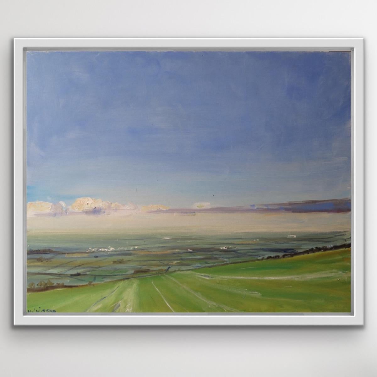 View from the Wolds, is an original painting by Malcom Ludvigsen. It’s a proper plein-air oil painting, painted on the spot from Garrowby Hill looking over the Vale of York. It is unframed but painted round the edge and D-rings and chord are
