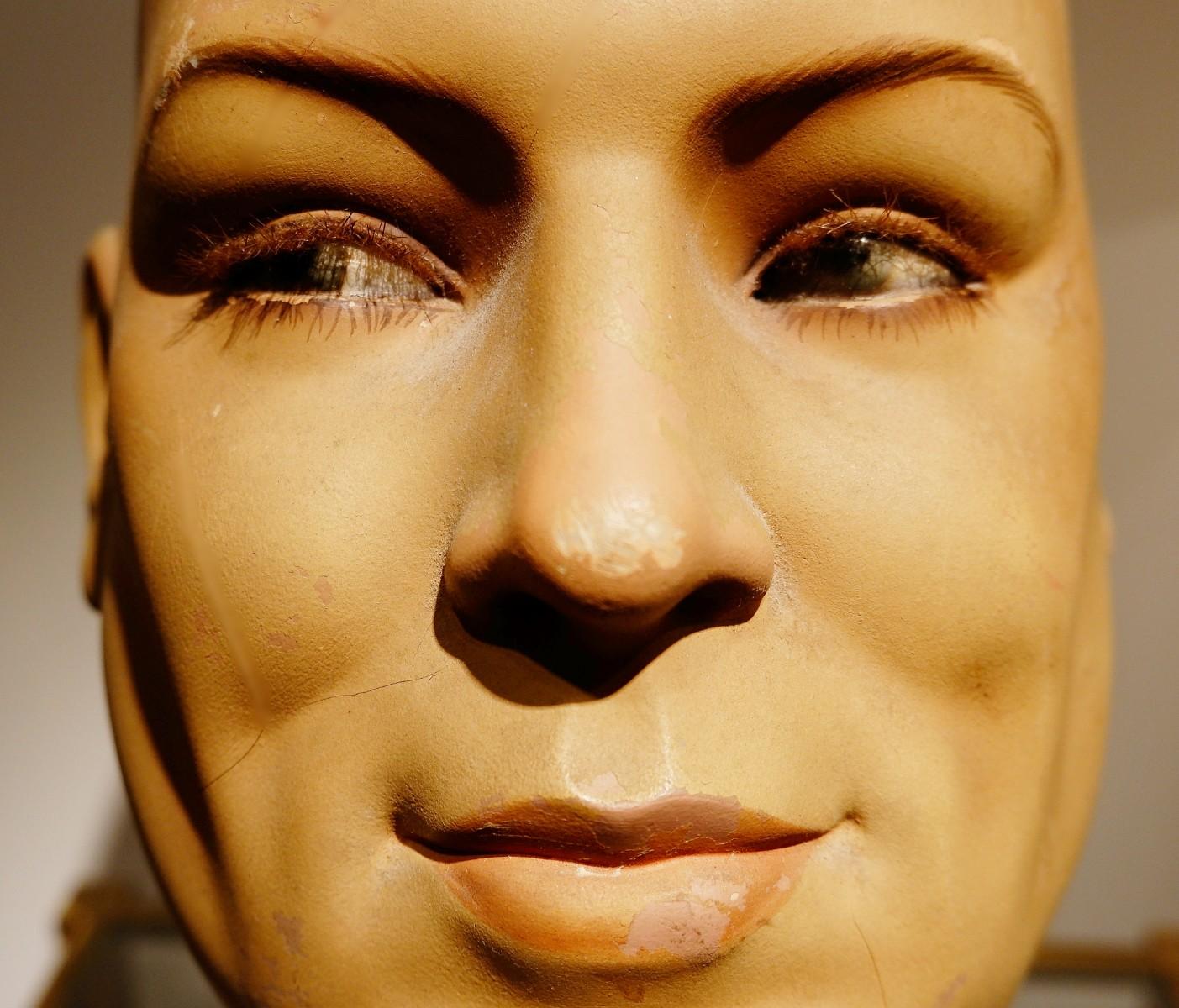Male mannequin head or millinery, store display.