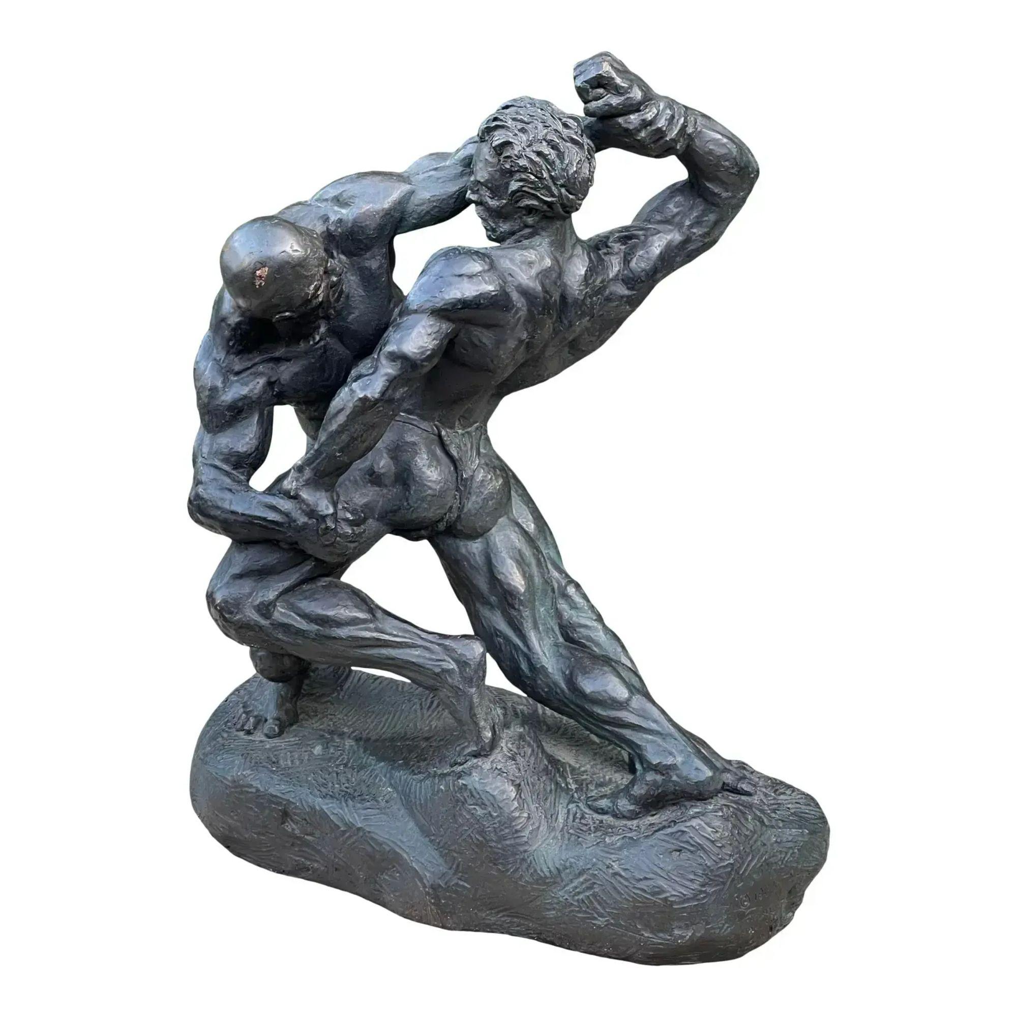 Male Nude composition sculpture of wrestlers. This lovely sculpture features two semi nude wrestler at combat. It has a patinated bronze painted finish but it is in fact composition.

Additional information:
Materials: Paint
Color: Brown
Art