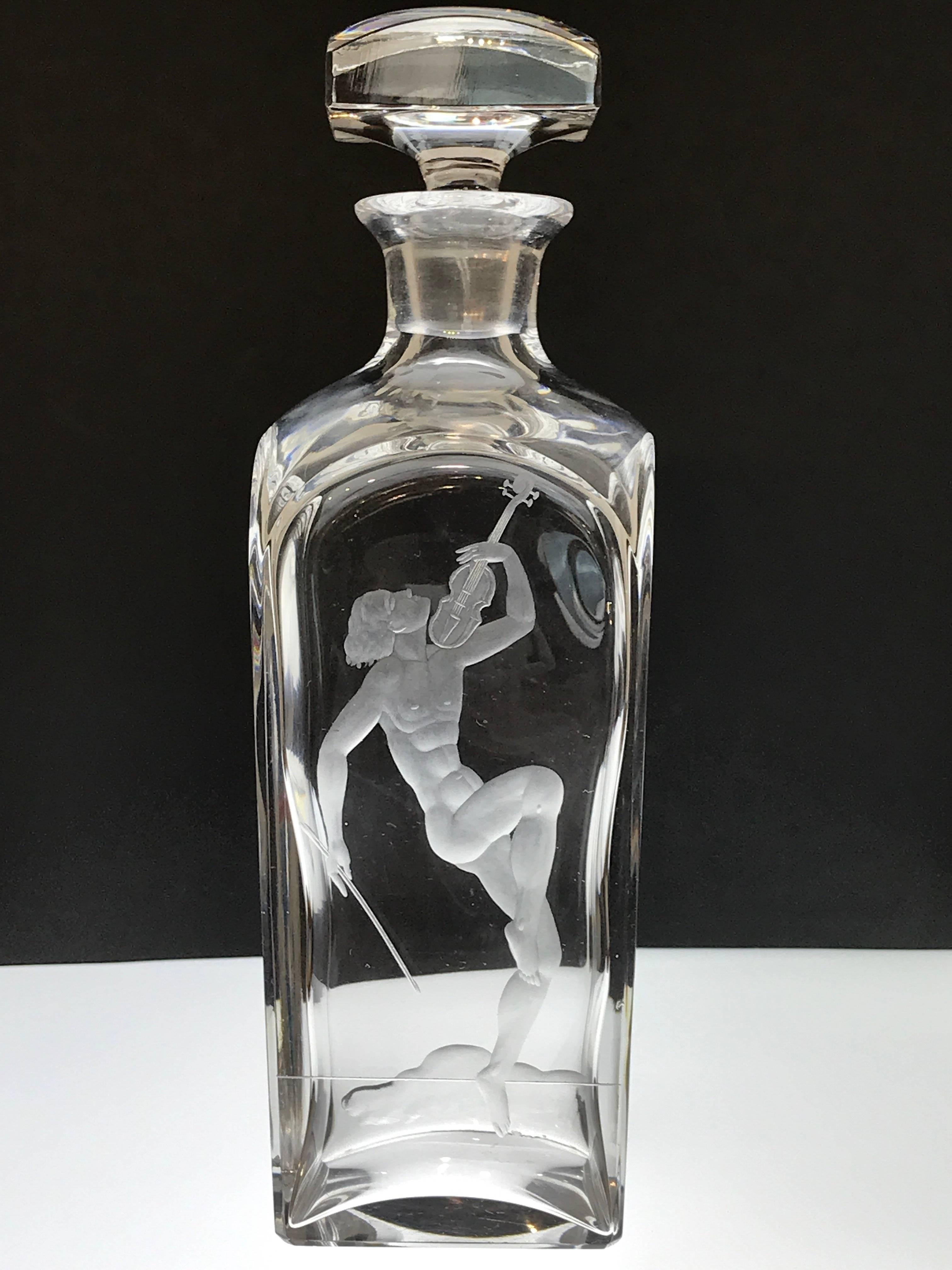 Male nude with violin decanter, in the style of Vicke Lindstrand, beautifully engraved. Signed with script signature and numbers.