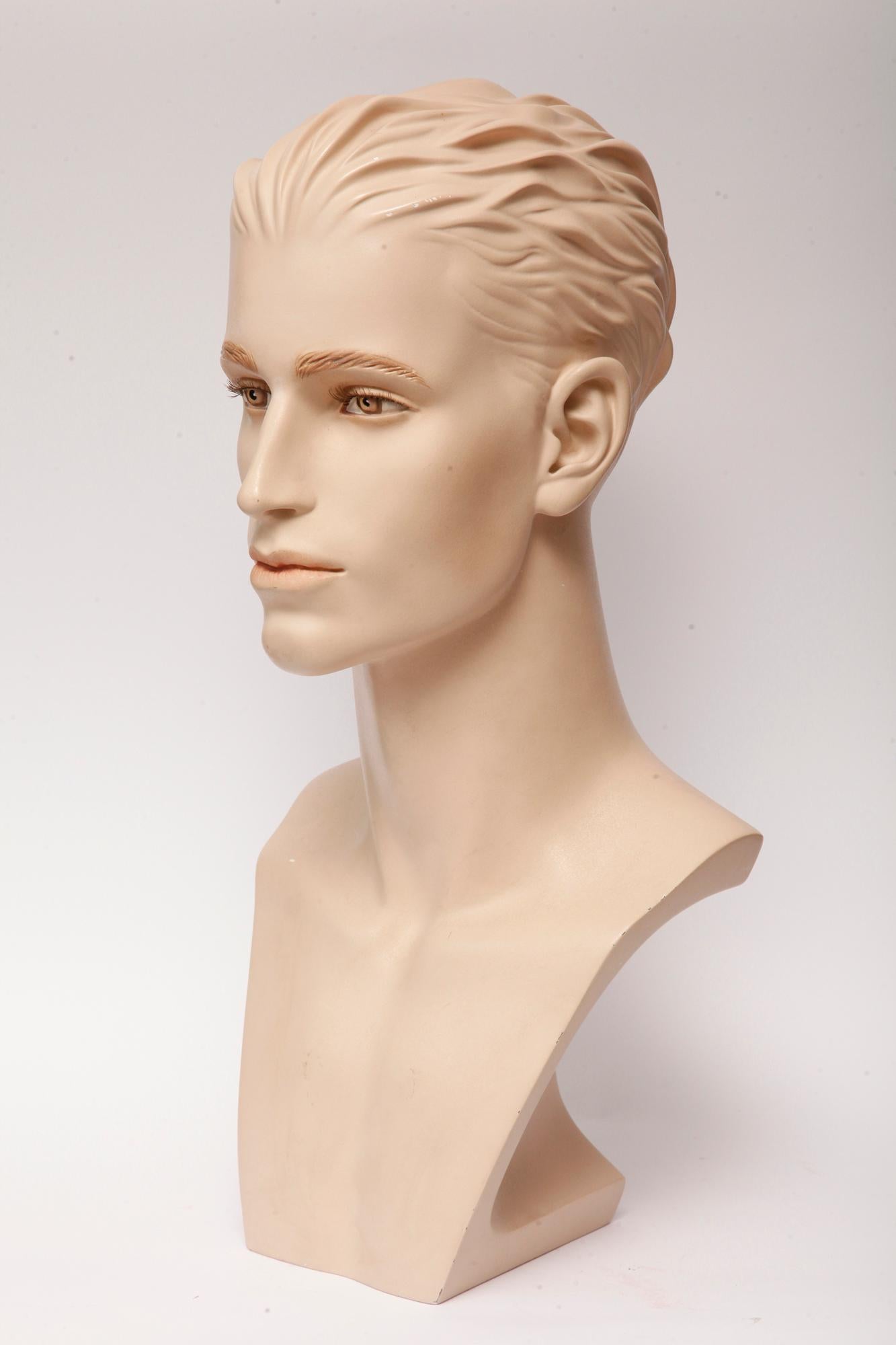 Men's realistic, advertising mannequin, bust used to display necklaces. Extremely realistic, meticulously finished in black ink, with realistic eyes, eyebrows and eyelashes. In excellent condition for its age, with the one minor gypsum defects in