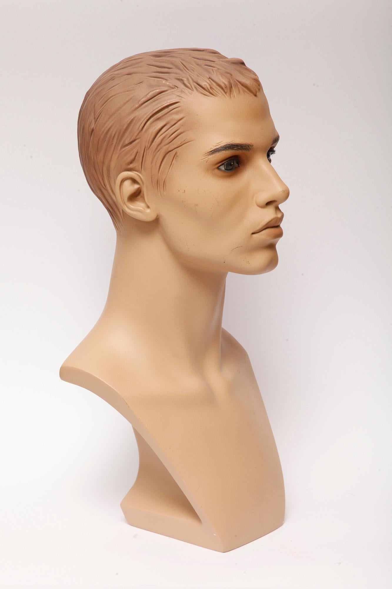 Men's realistic, advertising mannequin, bust used to display necklaces. Extremely realistic, meticulously finished in black ink, with realistic eyes, eyebrows and eyelashes. In excellent condition for its age, with the one minor gypsum defects at