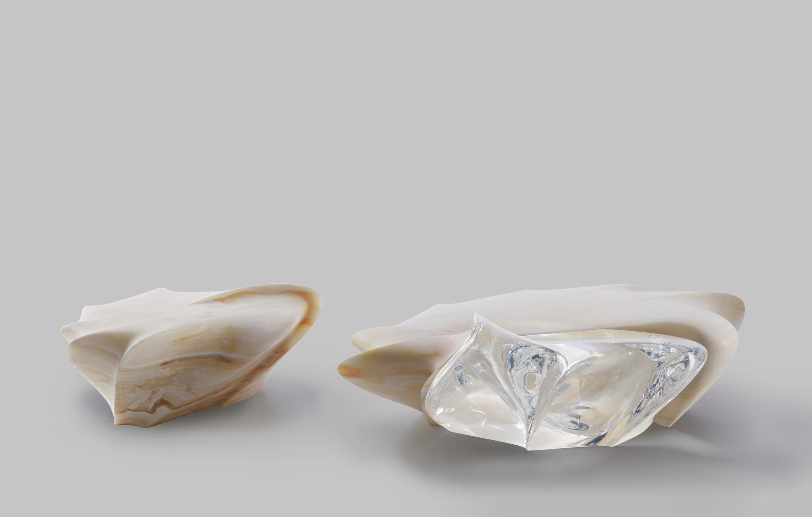Created in a limited edition, this statement piece in honed Ivory Onyx was designed by Zaha Hadid in collaboration with our partners in Italy. Mirroring the logic and coherence of nature, the design references the spiraling motif of seashells. Malea