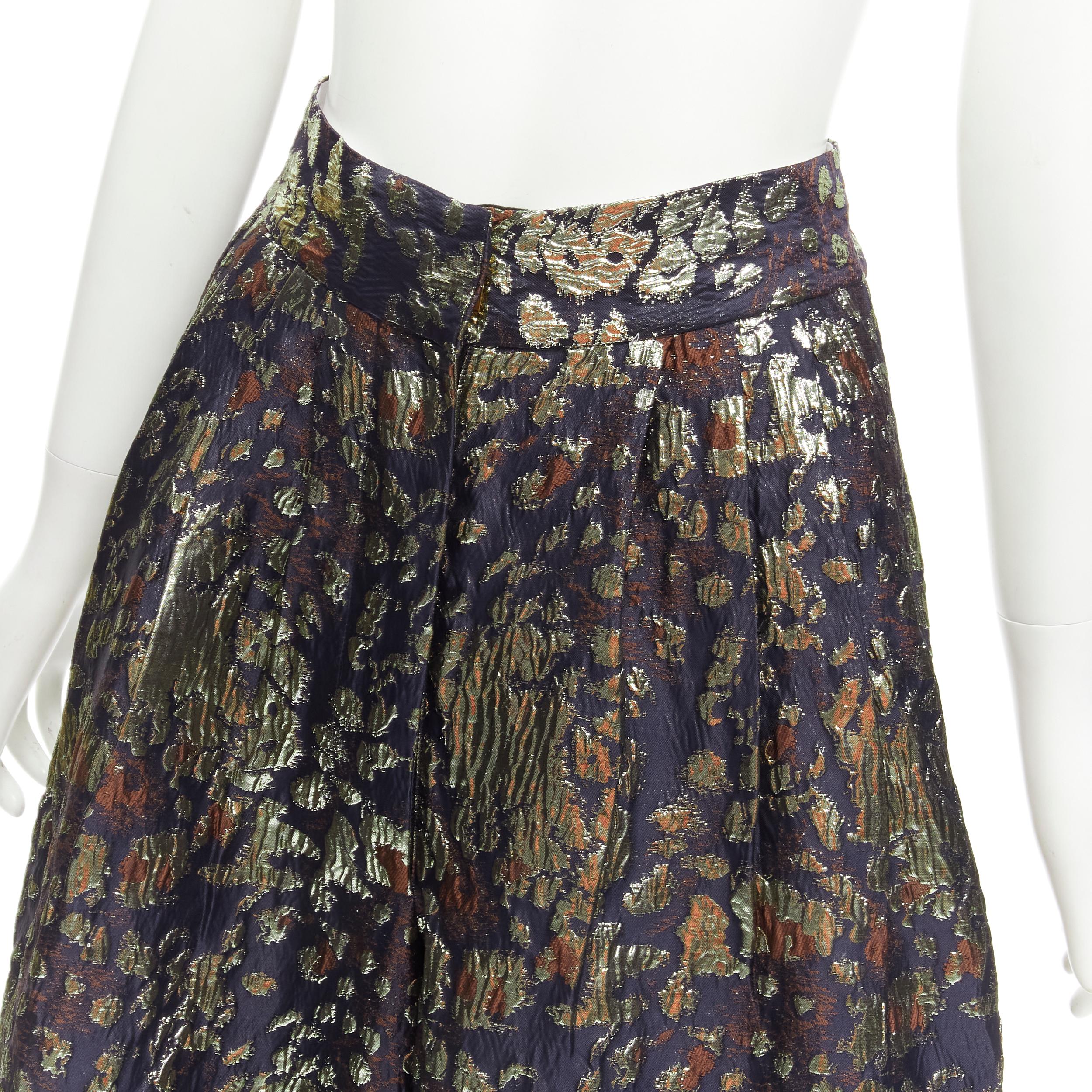 MALENE BIRGER Dinard gold metallic brocade wide leg culottes pants FR32 XXS
Reference: AAWC/A00354
Brand: Malene Birger
Model: Dinard
Material: Polyester, Blend
Color: Gold, Black
Pattern: Animal Print
Closure: Zip Fly
Extra Details: Two side slant