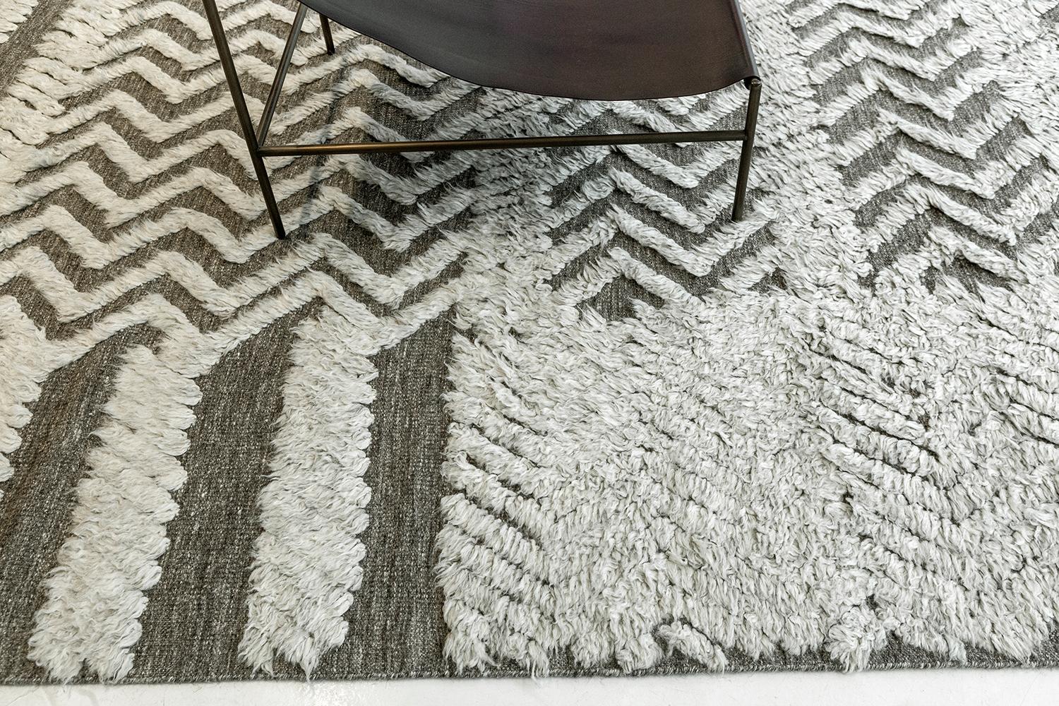 A plain and simple textured Malibu rug from ZigZigZag Collection that features a diagonal pile weave strokes. This phenomenal work of art gives the inspiration to enhance your contemporary interiors. An ash and charcoal tone that gives extra to your