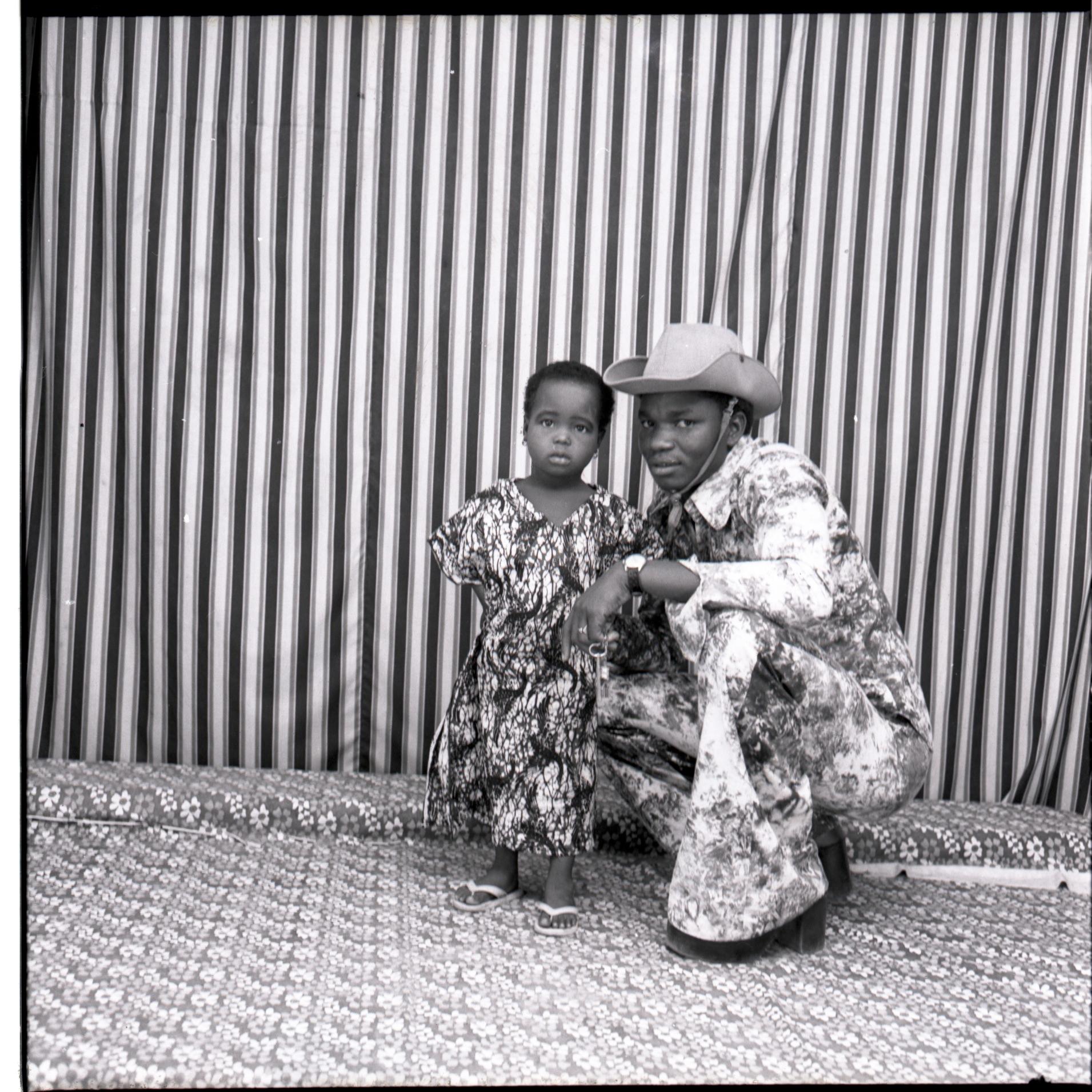 Malick Sidibé Black and White Photograph - Avec mon Enfant Silver Gelatin Print