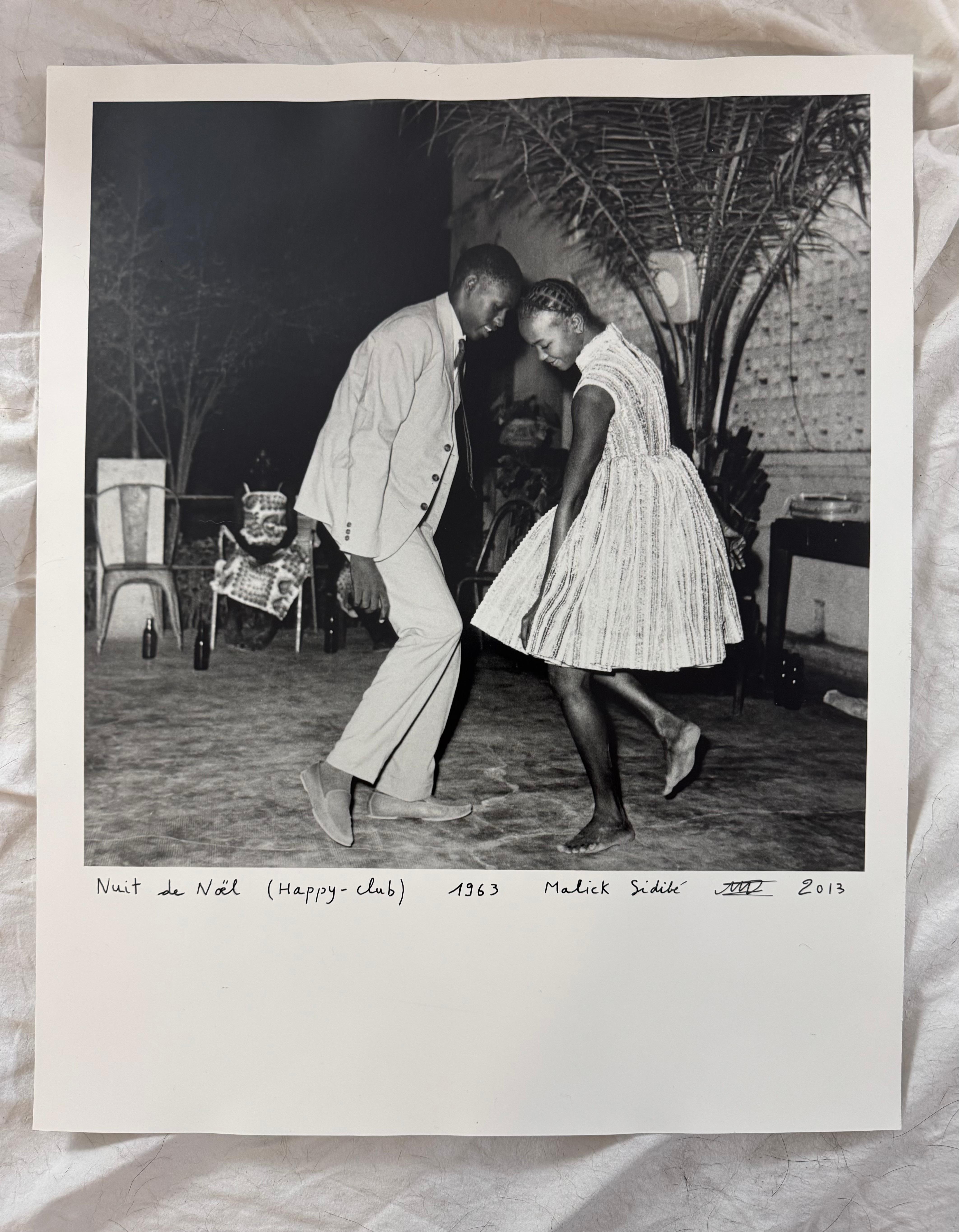Nuit de Noel - Photograph di Malick Sidibé
