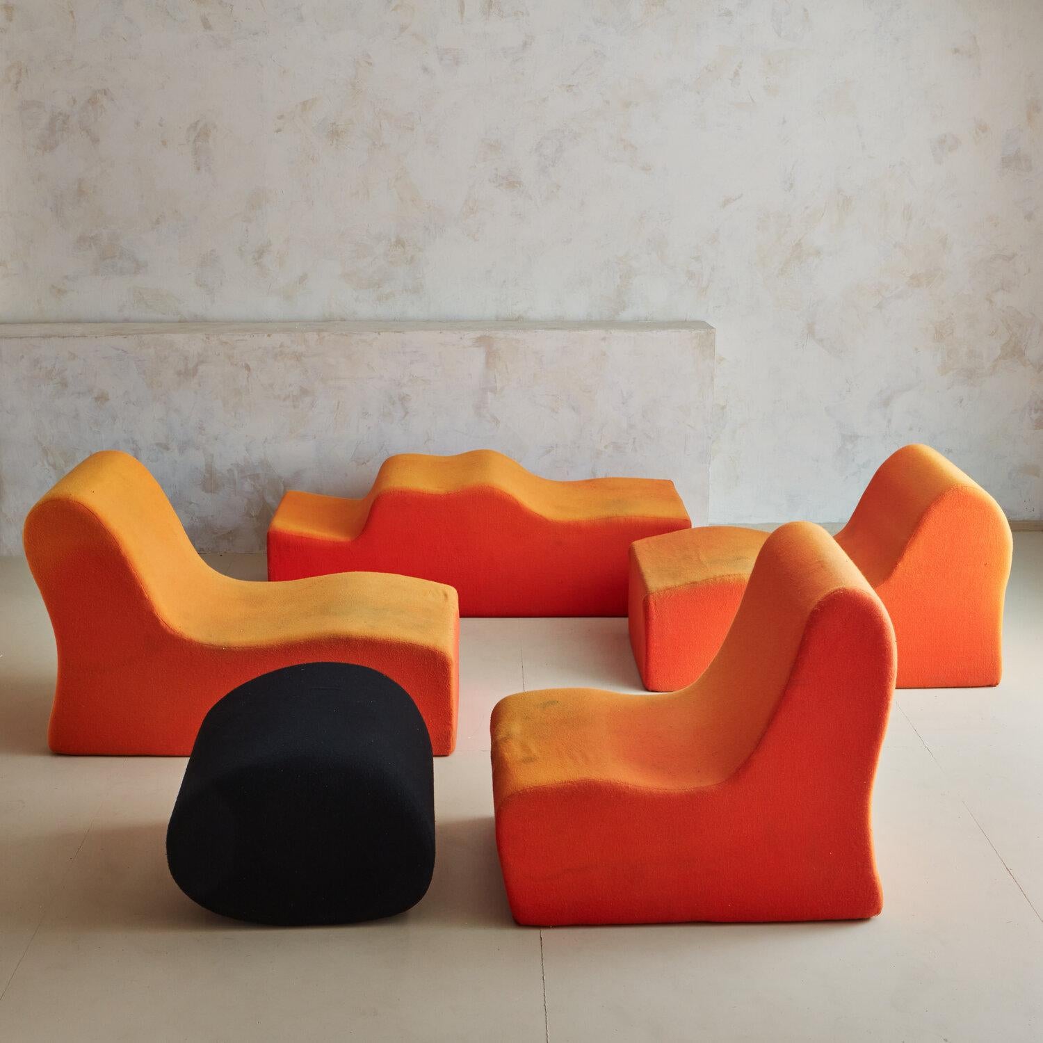 An organic, modular 5-piece collection of polyurethane foam shapes that function as a seating arrangement and also assemble into a sculptural block. Designed by Roberto Matta (Chilean, 1911-2002) in 1966 and manufactured by Gavina of Italy, this