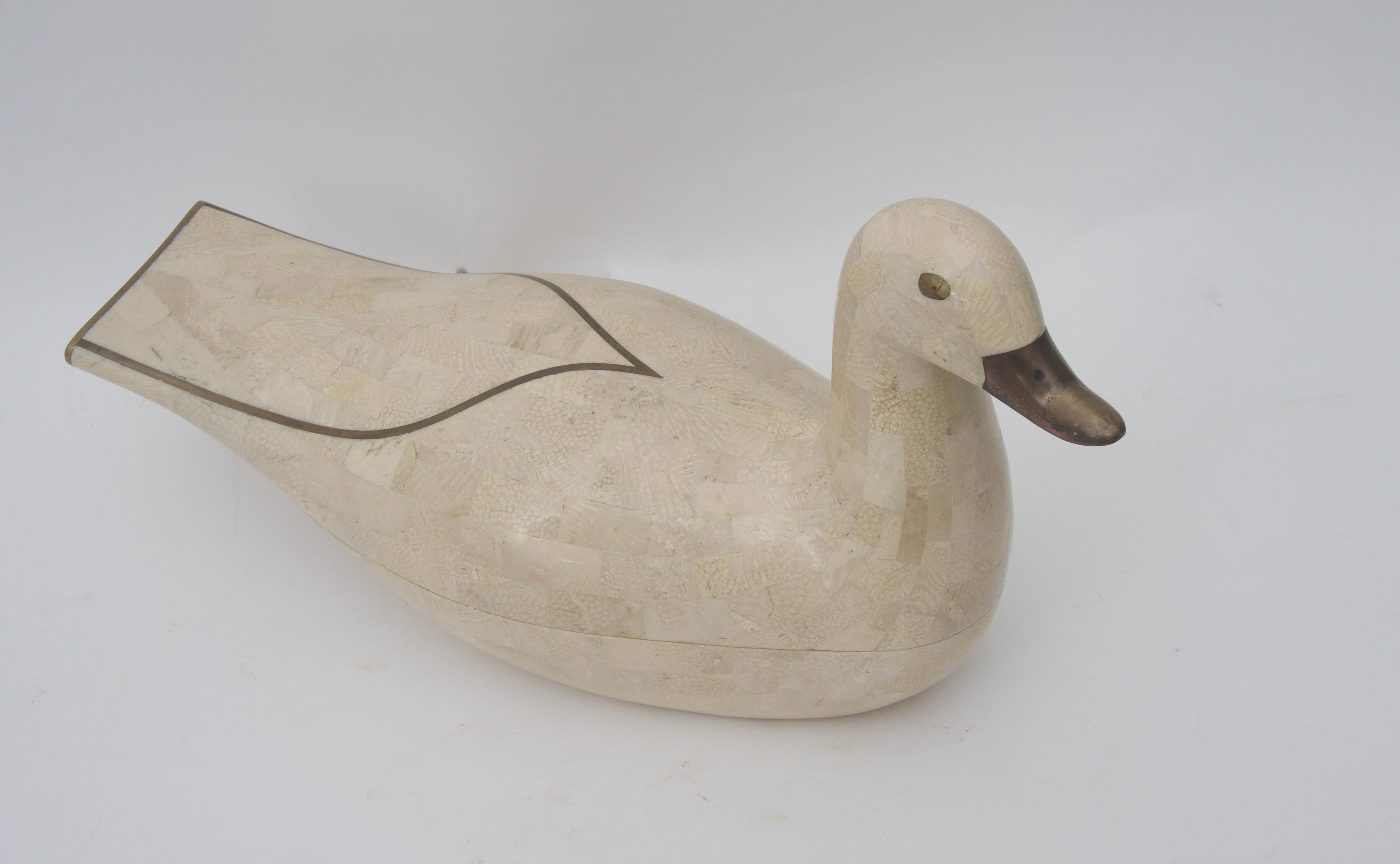 This stylish and charming Maitland Smith duck box will make a great place to hide the remote, car keys or desk accessories.