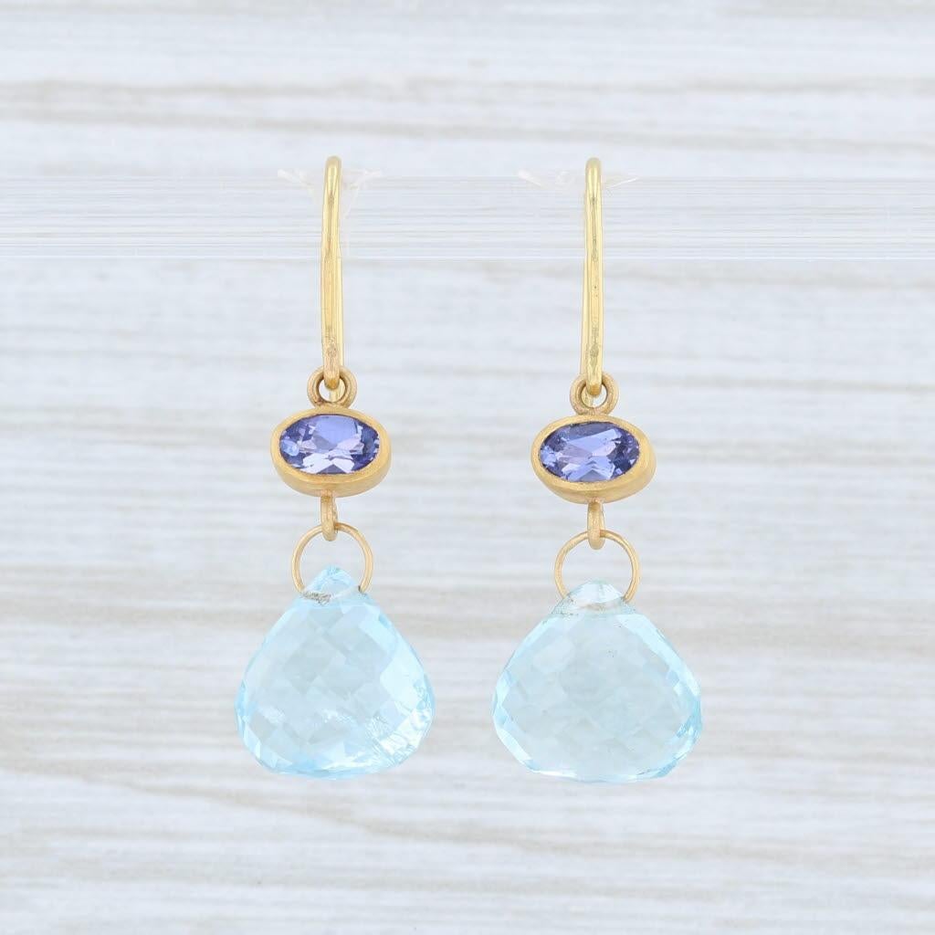 These lovely gemstone drop earrings are a Mallary Marks design.

Gem: Natural Aquamarine - 9.6 x 10 mm, Pear Shape Briolette Cut, Light Blue Color, Heat Treatment
- Natural Tanzanite - 0.56 Total Carats, Oval Brilliant Cut, Purple Color, Heat