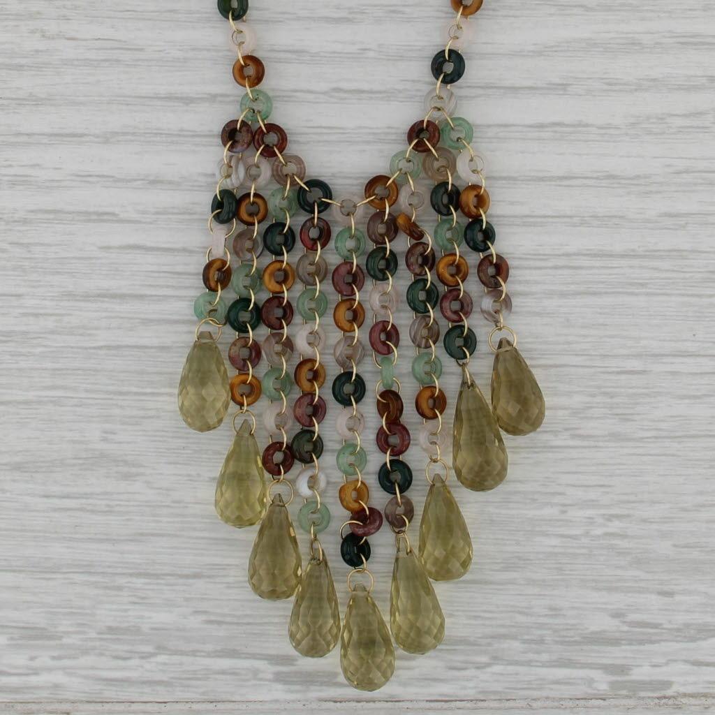 Gemma: Quarzo naturale - 5,5 - 7,5 carati totali (7,7 X 15 - 8,1 X 18,2 mm), taglio a brioletta, colore giallo
Quarzo Torus - 5 x 2 mm - Occhio di tigre, pietra di sangue, quarzo avventurina, quarzo rosa, agata marrone rossastra e incolore /