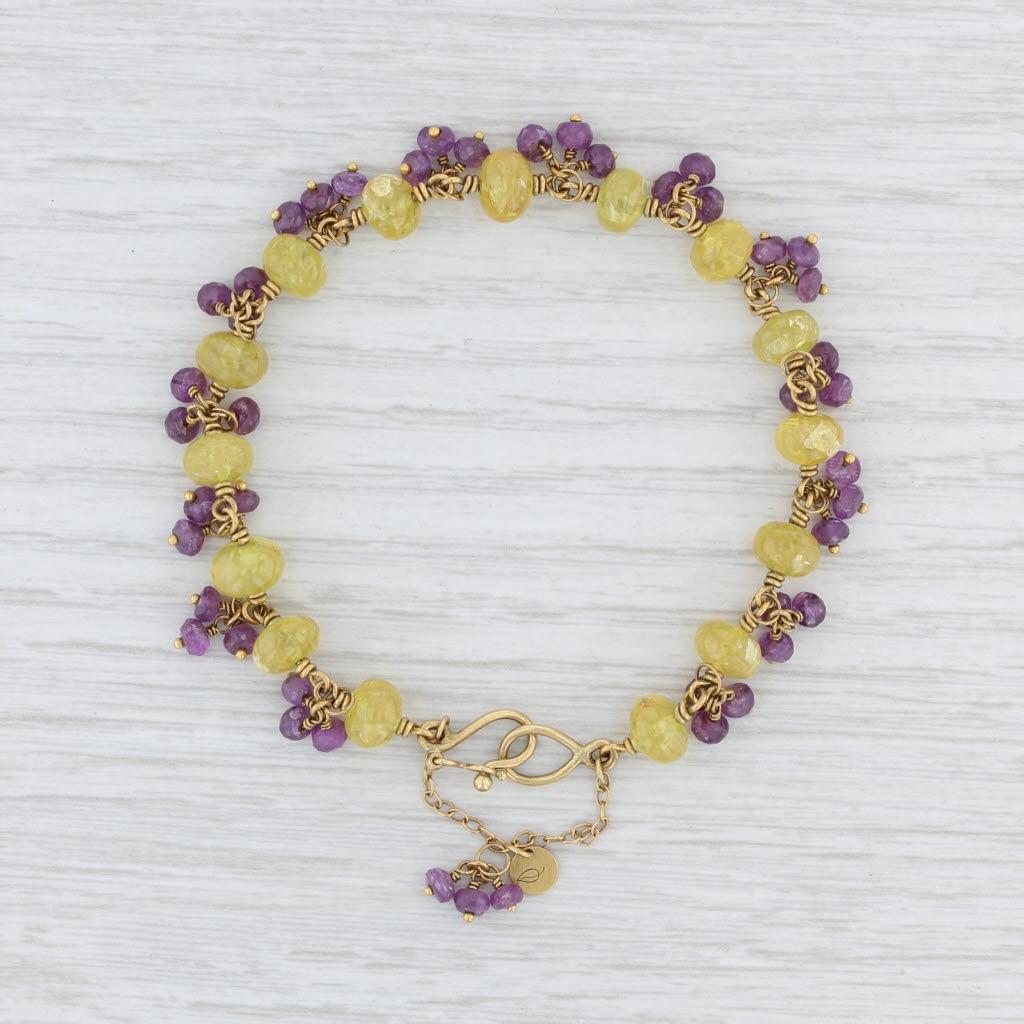 Gem: Natural Sapphires -
 - Yellow - 6.6 - 7.3 mm, Round Shape, Heat Treatment
- Purple - 3.4 - 3.7 mm, Round Shape, Heat Treatment
Metal: 22k & 18k Yellow Gold
Weight: 16.7 Grams 
Stamps: 22 / 18 MM
Style: Bead Chain
Closure: Hook Post with