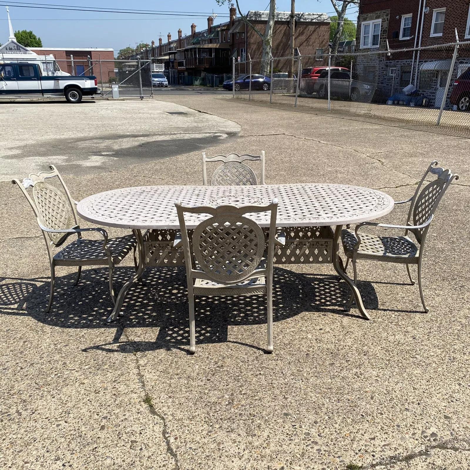 Mallin Cast Aluminum Tuscan Style Beige Lattice Outdoor Patio Dining Table Set - 5 Pc Set. Iteam features (1) Large 84