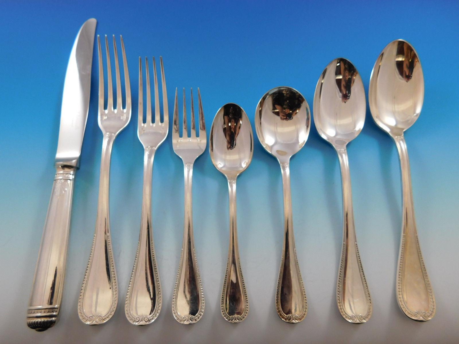 Monumental dinner size Malmaison by Christofle silver plate flatware set 106 pieces. This set includes:

12 dinner knives, 10