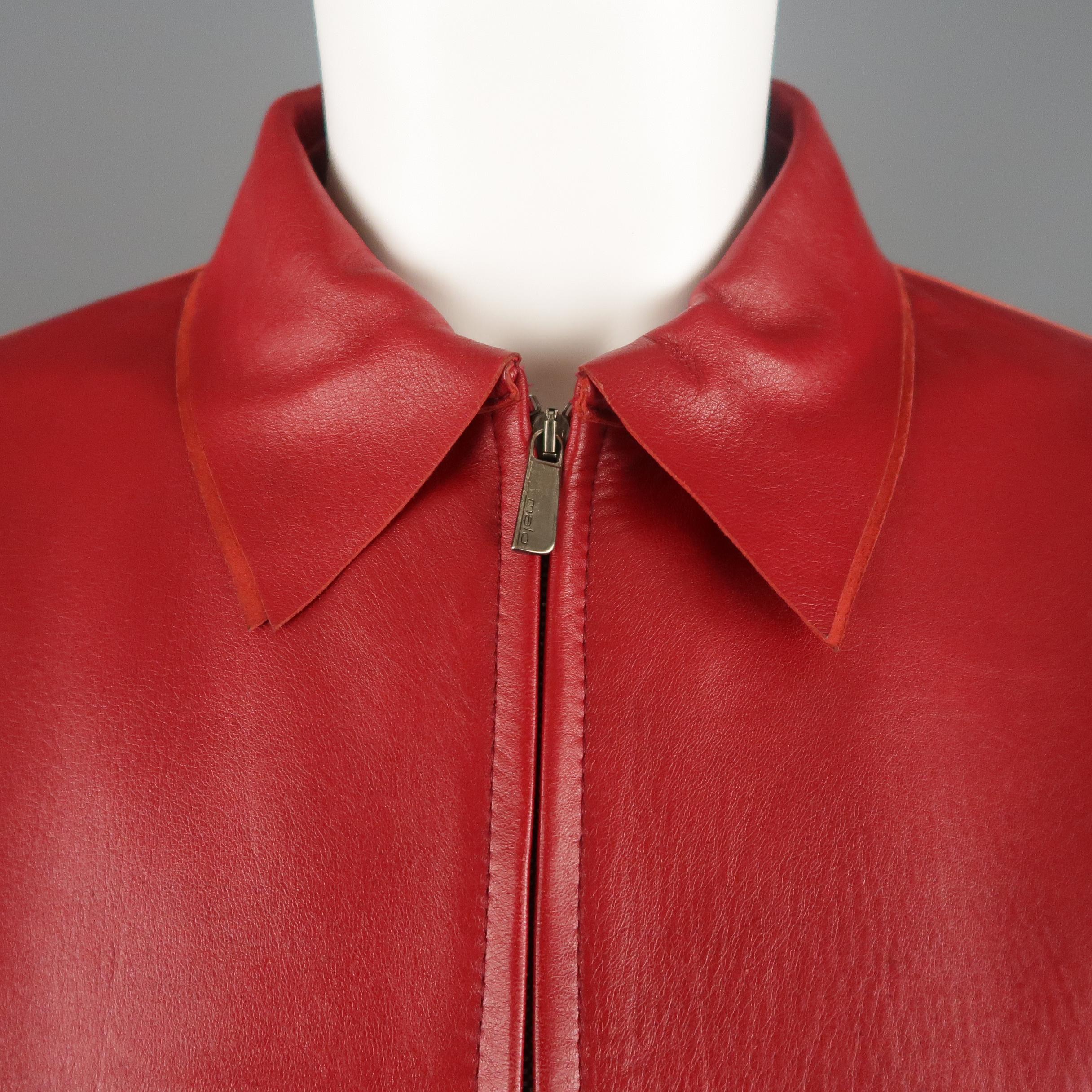 MALO jacket comes in red smooth leather with a layered pointed collar, cuffed sleeve, and double zip front. Lined in leather. Some spots shown in detail shots. As-is. Made in Italy.
 
Good Pre-Owned Condition.
Marked: IT 42
 
Measurements:
