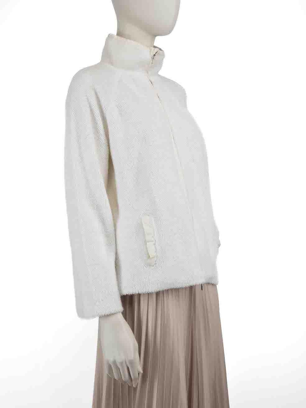 CONDITION is Very good. Minimal wear to jacket is evident. There are some very faint marks to the weave on this used Malo designer resale item.
 
 
 
 Details
 
 
 White
 
 Cotton
 
 Jacket
 
 Zip fastening
 
 Mock neck
 
 2x Side pockets
 
 Looped