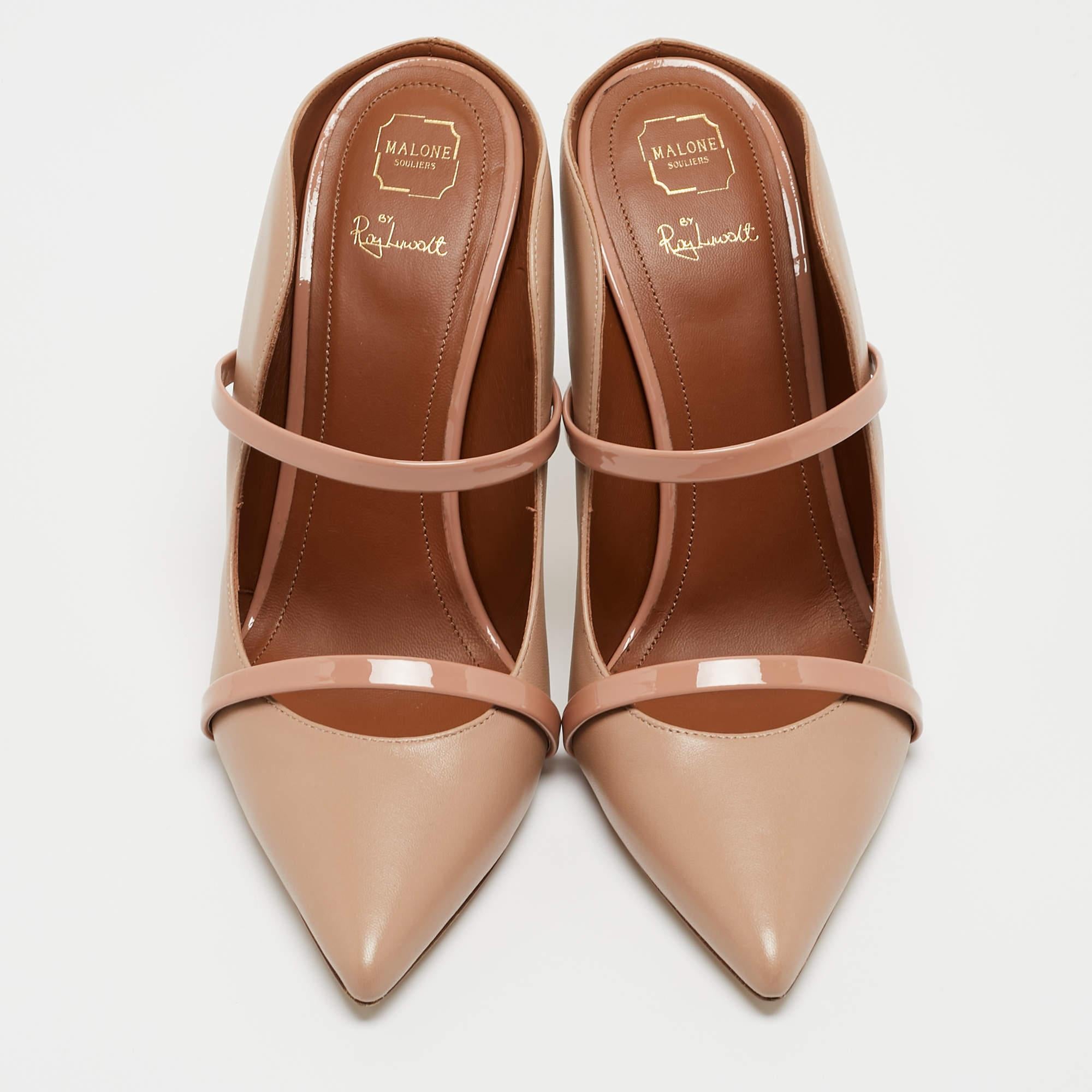 Admired for its waved silhouette, these Malone Souliers mules will make sure the spotlight follows you everywhere. The strap detailing across the beige upper enhances its contemporary shape. Created from leather, they are complete with a slip-on