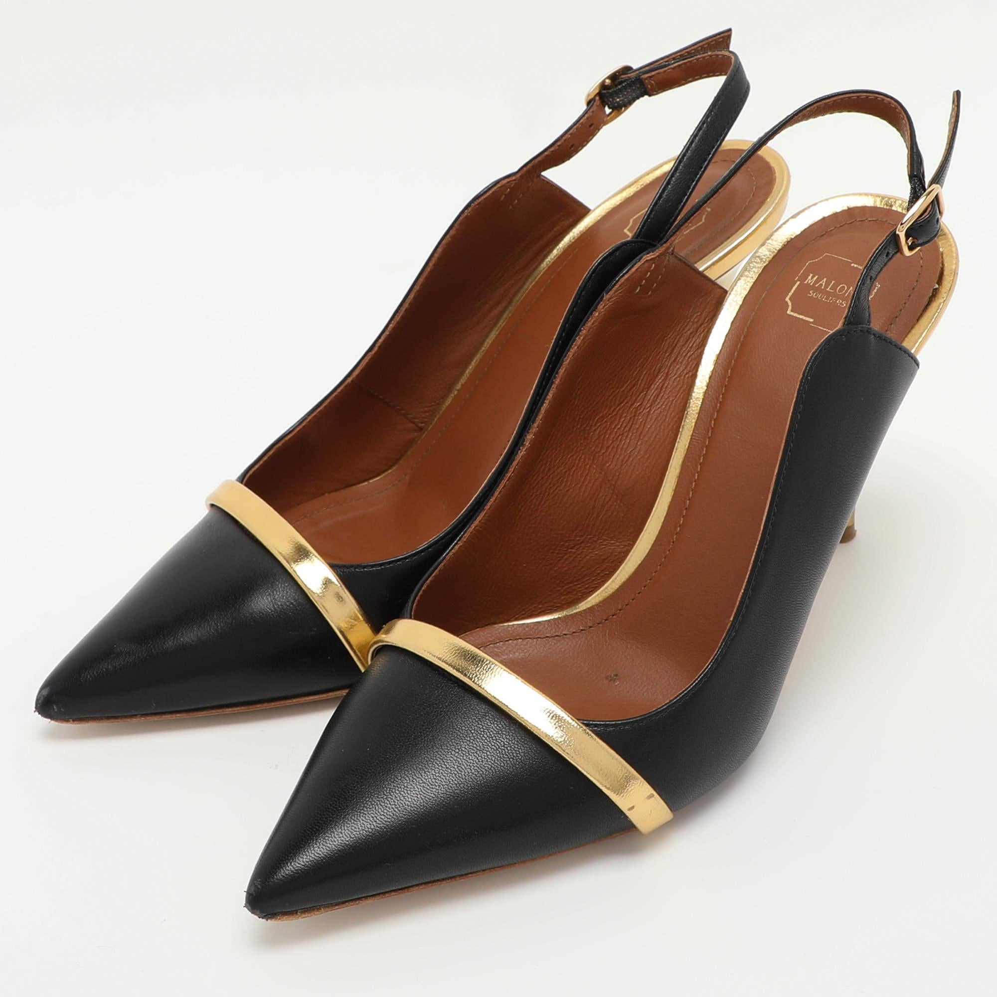 Malone Souliers es conocida por sus elegantes diseños y la marca es sinónimo de opulencia, feminidad y elegancia. Estos zapatos de tacón negro y dorado, con puntera en punta, diseño de tira con hebilla y tacón de aguja, son elegantes y sofisticados.