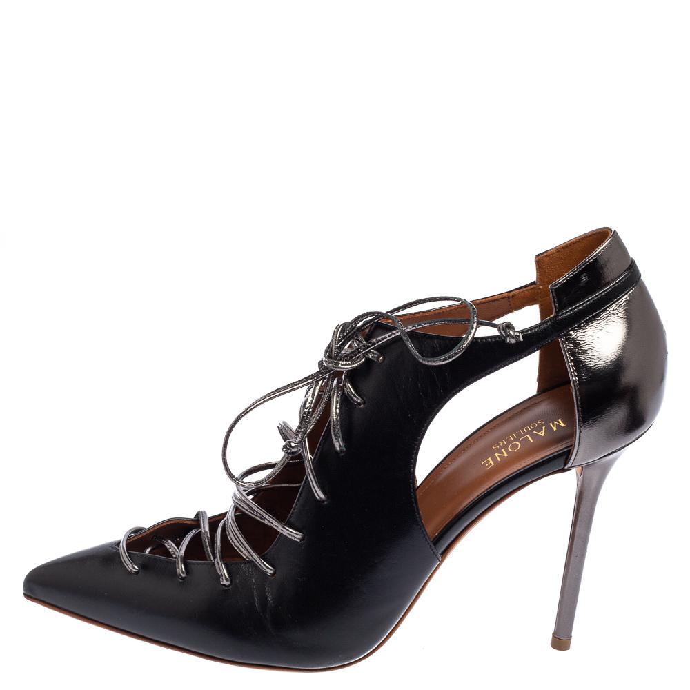 The Montana booties by Malone Souliers are apt for all occasions. Crafted from black leather, these booties feature pointed toes, cut-out details, a lace-up front, and 10.5 cm high heels. They are accentuated with comfortable leather-lined soles.