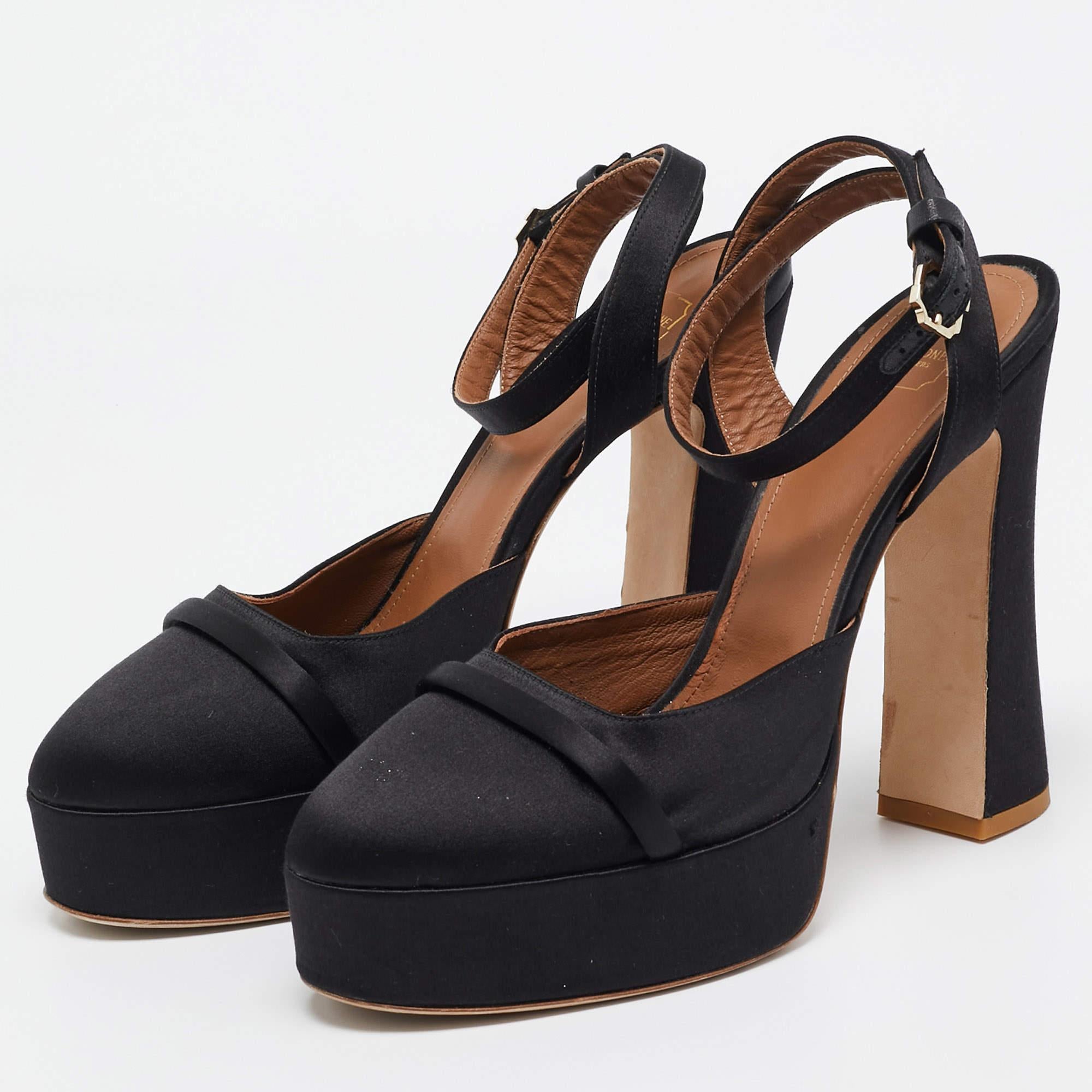 Faites preuve de chic avec ces escarpins de créateur. Ils présentent des talons robustes et des semelles durables, parfaits pour vos sorties à la mode.