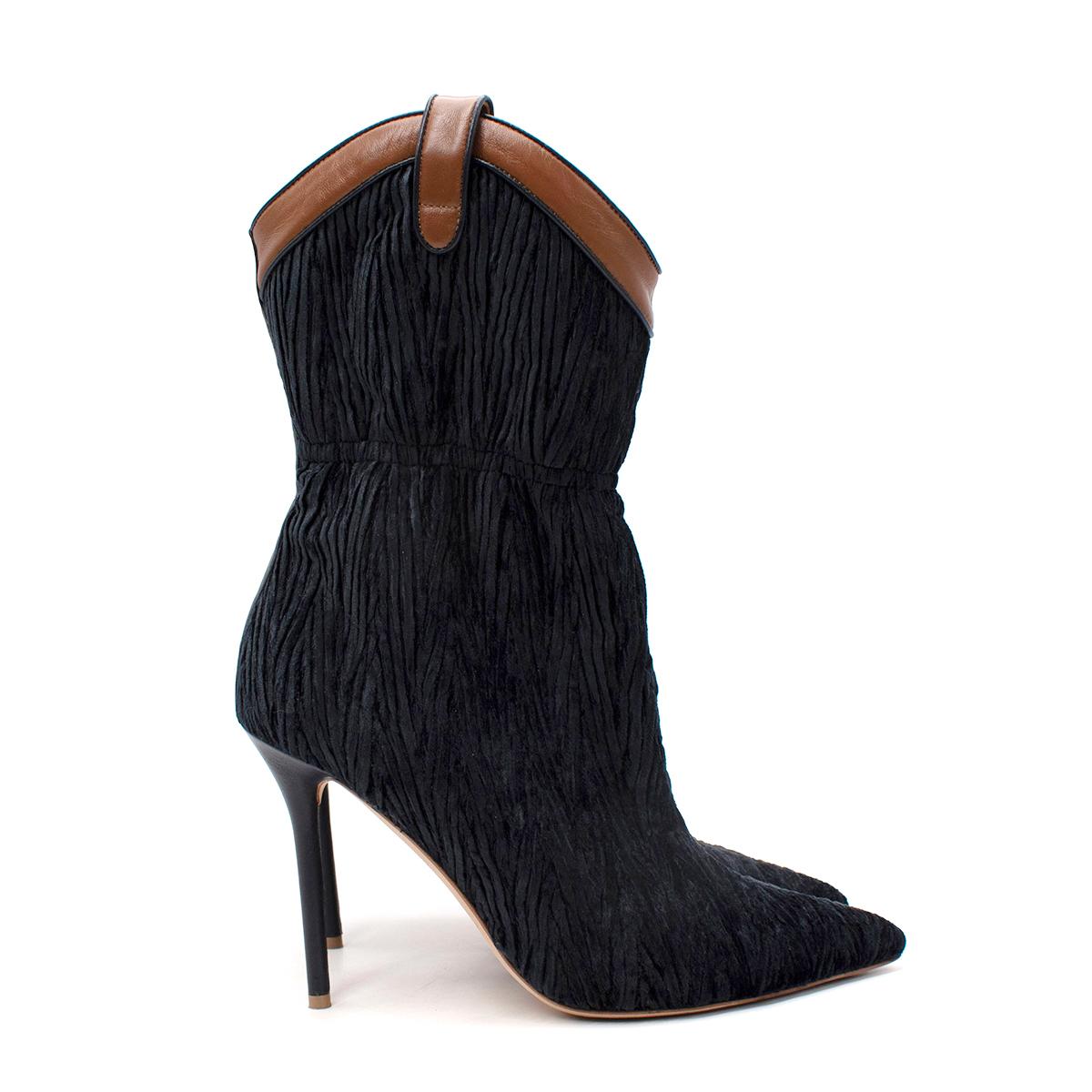 Malone Souliers Daisy Deep Navy Velvet & Leather Heeled Ankle Boots

- Crafted from a deep navy, almost black corduroy velvet, with a rich tan trim, these boots feature a sharply pointed toe, and a nod to western style with a ruched ankle detail,