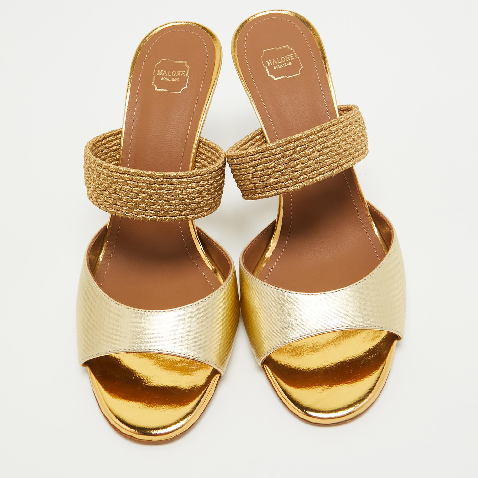 Crafted in a classy hue, we love these Malone Souliers mules. Designed to make a statement, they have a sleek silhouette and a nice fit. Wear yours under maxi skirts for a peek of glamor, or let them shine with cropped hemlines.


