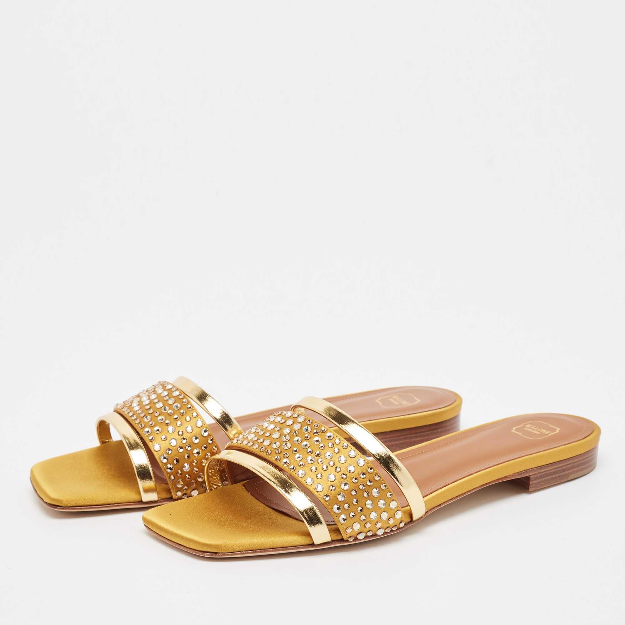 Enhance your casual looks with a touch of high style with these designer slides. Rendered in quality material with a lovely hue adorning its expanse this pair is a must have
