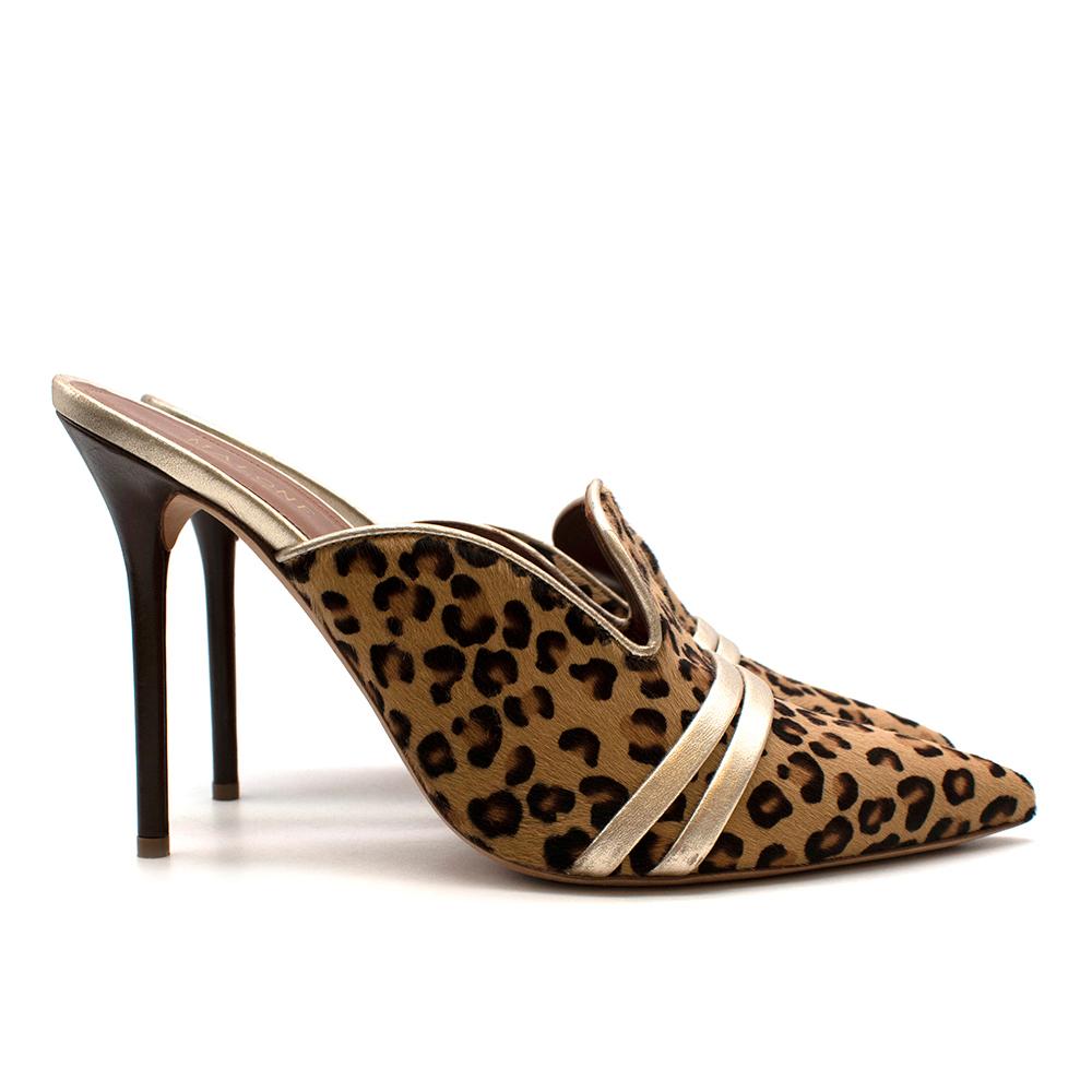 Malone Souliers Leopard Pony Style Calf Hair Hayley Mules

Malone Souliers brings the luxurious craftsmanship of Savile Row to womens footwear, and this pair of leopard print Hayley mules exemplifies this opulent approach. Handmade from leather,