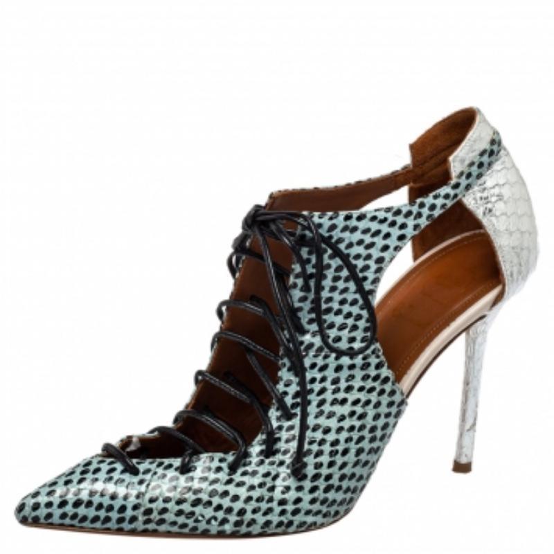 The Montana booties by Malone Souliers are for fashionable days and nights. Crafted from python leather, the booties feature pointed toes, cut-out details, lace-up front, and high heels. NOTE: AVAILABLE FOR UAE CUSTOMERS ONLY.