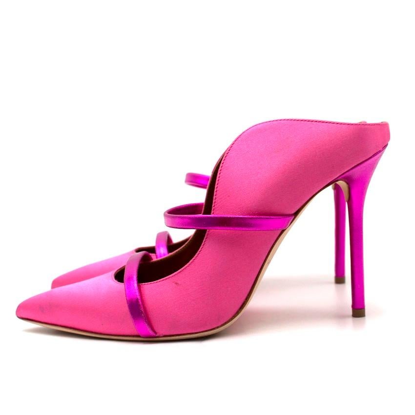 Malone Souliers Satin Maureen Mules

- Cerise pink satin 
- Metallic fuscia leather straps with slight elastication which secure the foot into the shoe
- Closed pointed toe
- Metallic fuscia leather high stiletto heel
- Brown leather lining with