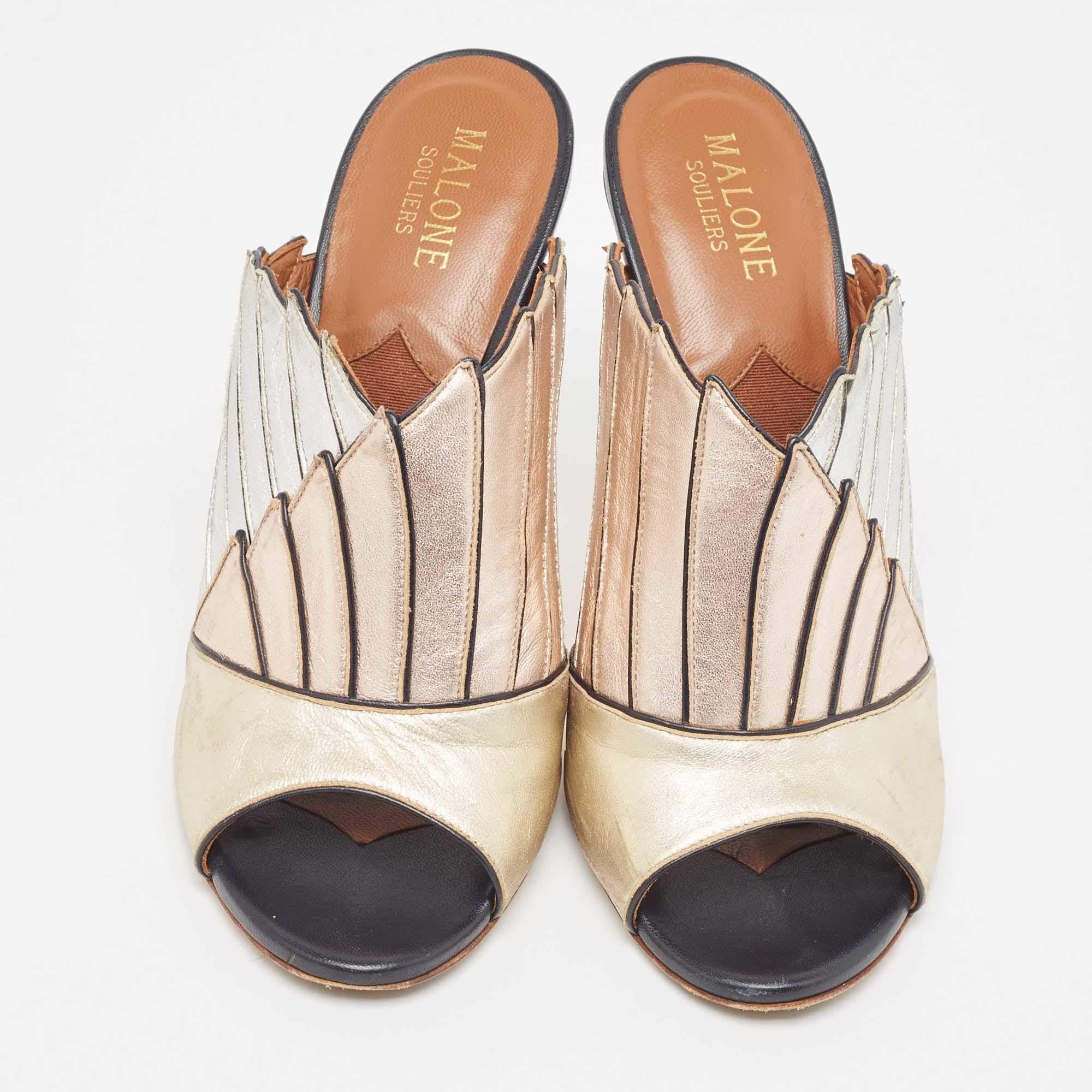 A pair to admire and treasure is this tricolor one by Malone Souliers. On the shoes, one can see an intricate design and an eye-catching design. They have leather uppers, open toes and 12cm heels.

