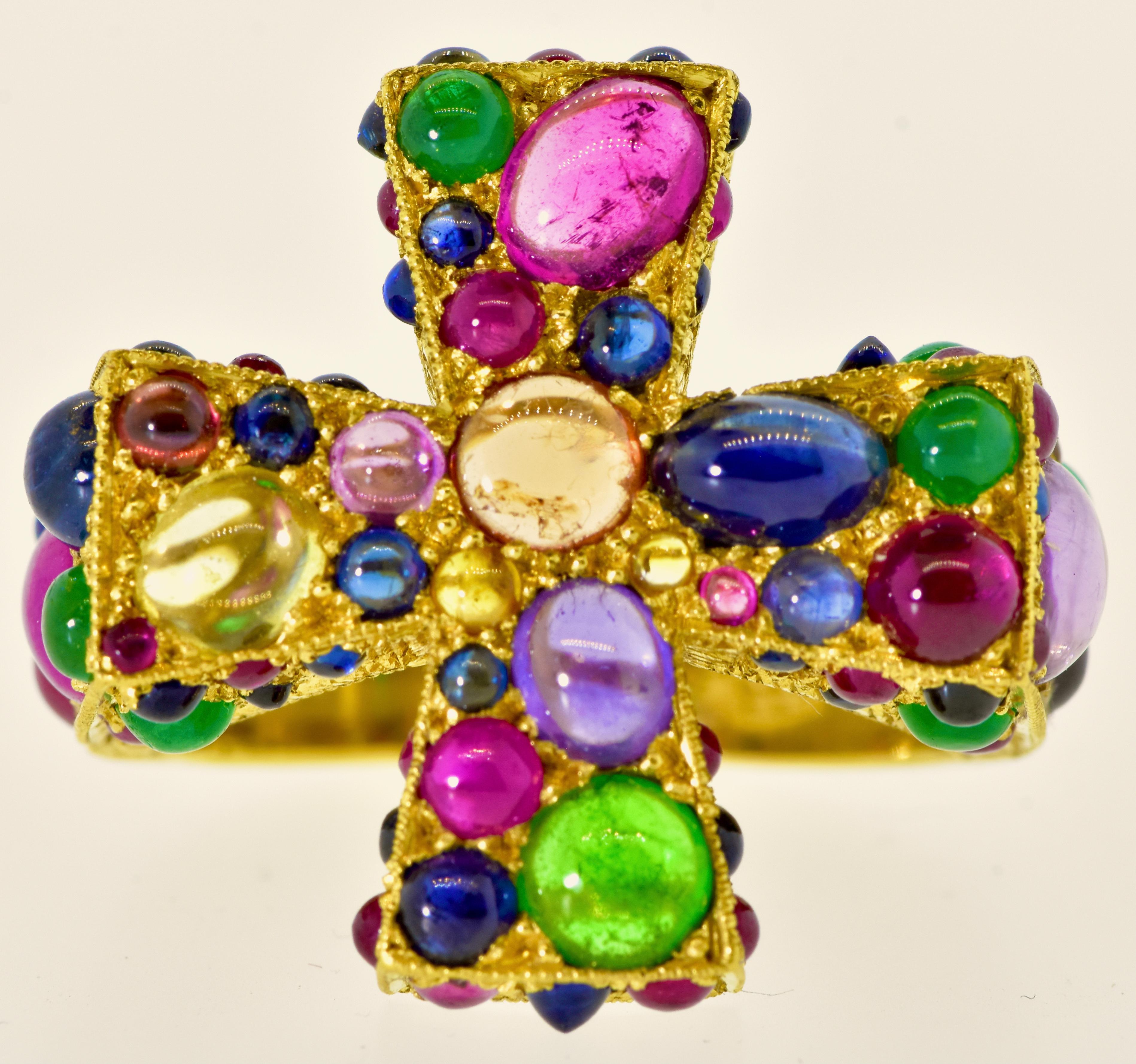 22K ring in the form of a Maltese cross set with natural rubies, sapphires, emeralds, amethyst and citrine.  This unusual ring.  The 82 bead set natural stones are all very lively and in fine condition.  There are approximately 7.5 cts of sapphires
