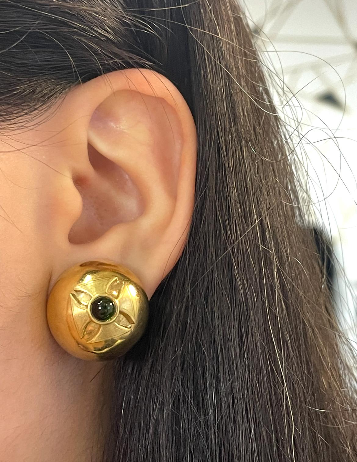 Maltese Cross Tourmaline Earrings

A pair of yellow gold earrings set with cabochon tourmaline. 

Approximate diameter: .75
