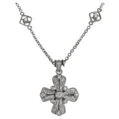 Croix de Malte en diamants par Judith Ripka en or blanc