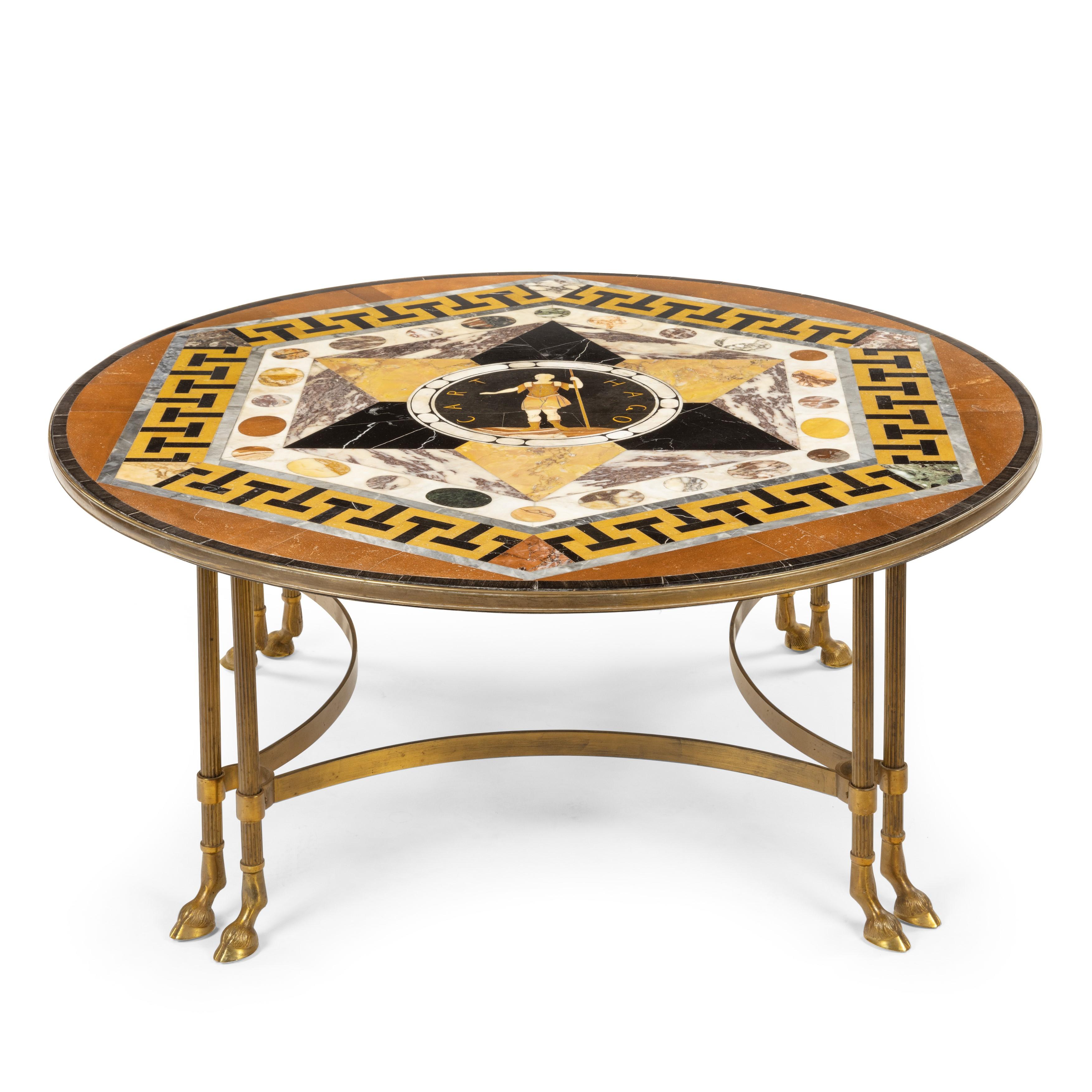 A fine maltese specimen marble tabletop attributed to Joseph Darmanin of Malta of larger than usual size.

Now set of a brass base and set as a coffee table.

This fine top depicts a classical warrior and the word carthago (carthage) the