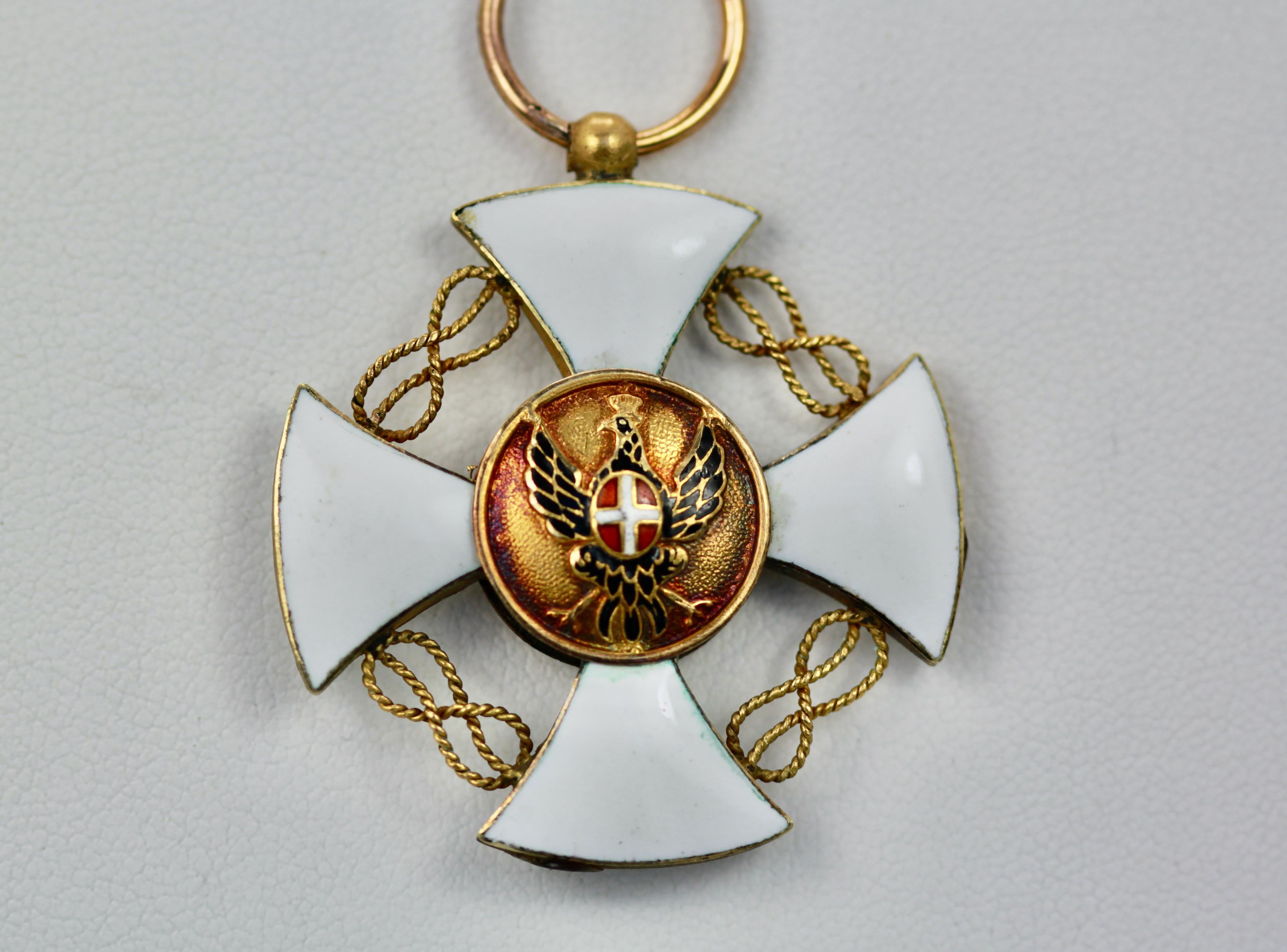 This White Enamel Maltese cross Pendant is in great condition.  I just love these old medals and finding them in 14K or 18K is rare as most were made with base metal.  Most of these crosses are two sided and this is no different. One side of this