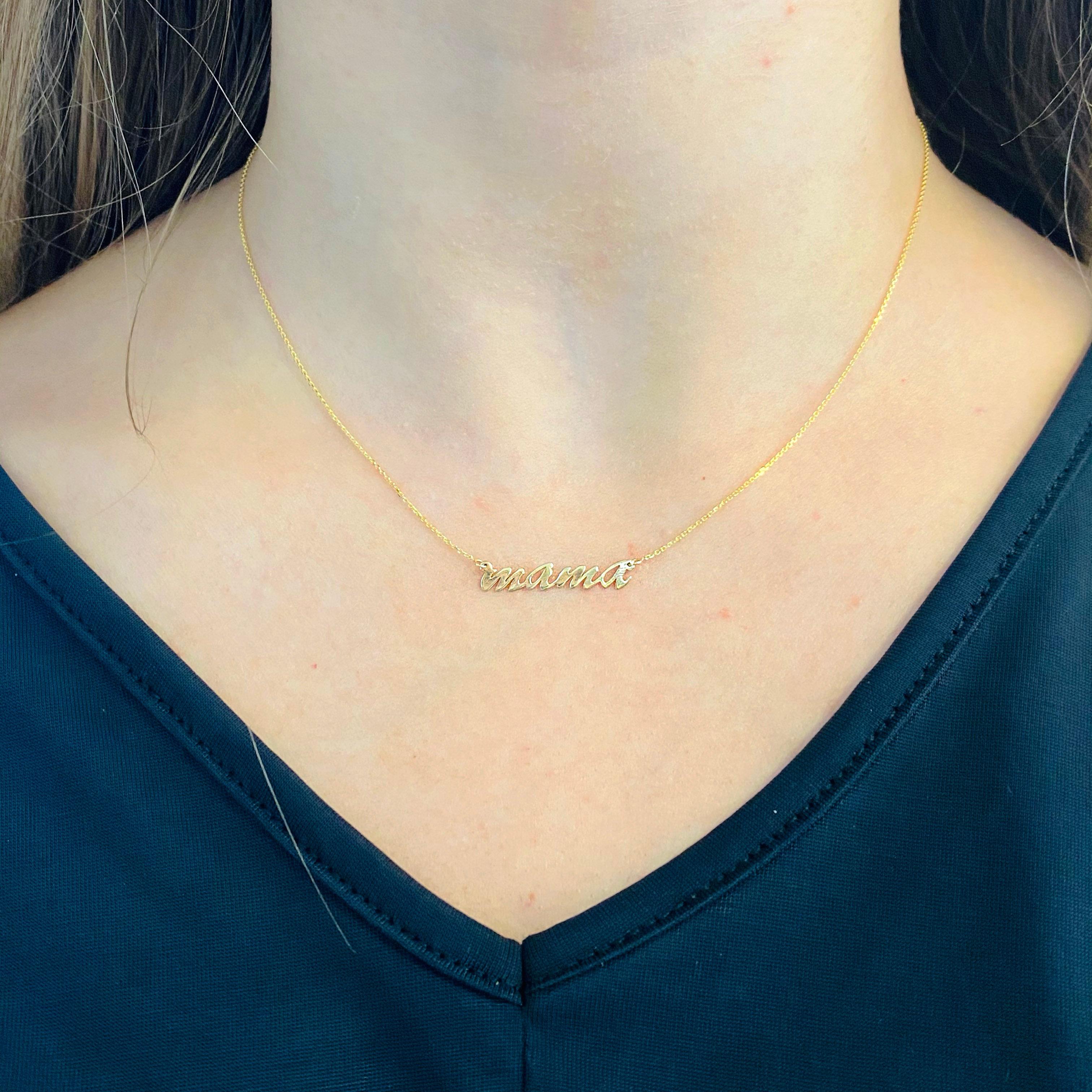 The Mama Necklace is Adorable!  It is made with a cute font that sits perfectly in the nap of a woman’s neck.  The mama nameplate can be ordered with any letters and up to eight letters.  This nameplate is 14 karat yellow gold and the cable chain