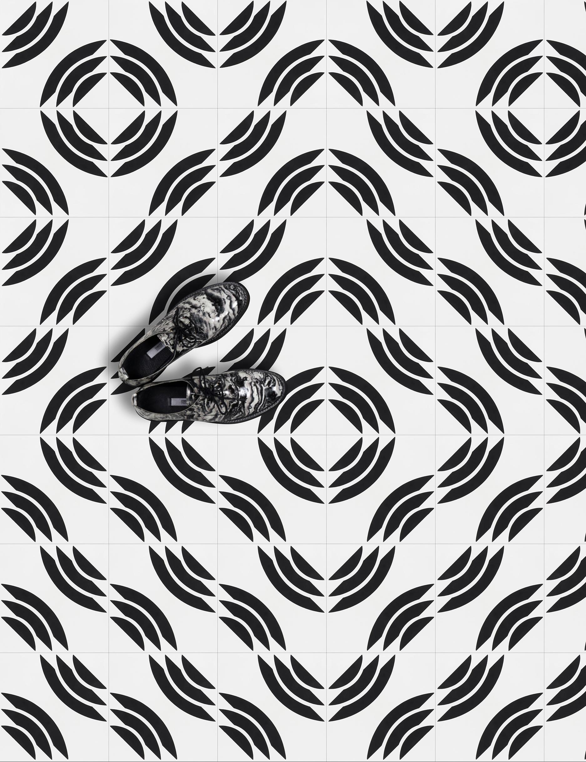 A snakelike shape that twists and turns to form an infinite range of winding patterns for your surface.

Cement Tiles
Type: Encaustic cement tile
Production process: Hydraulic pressing process
Materials: White cement, stone powder, additives, grey