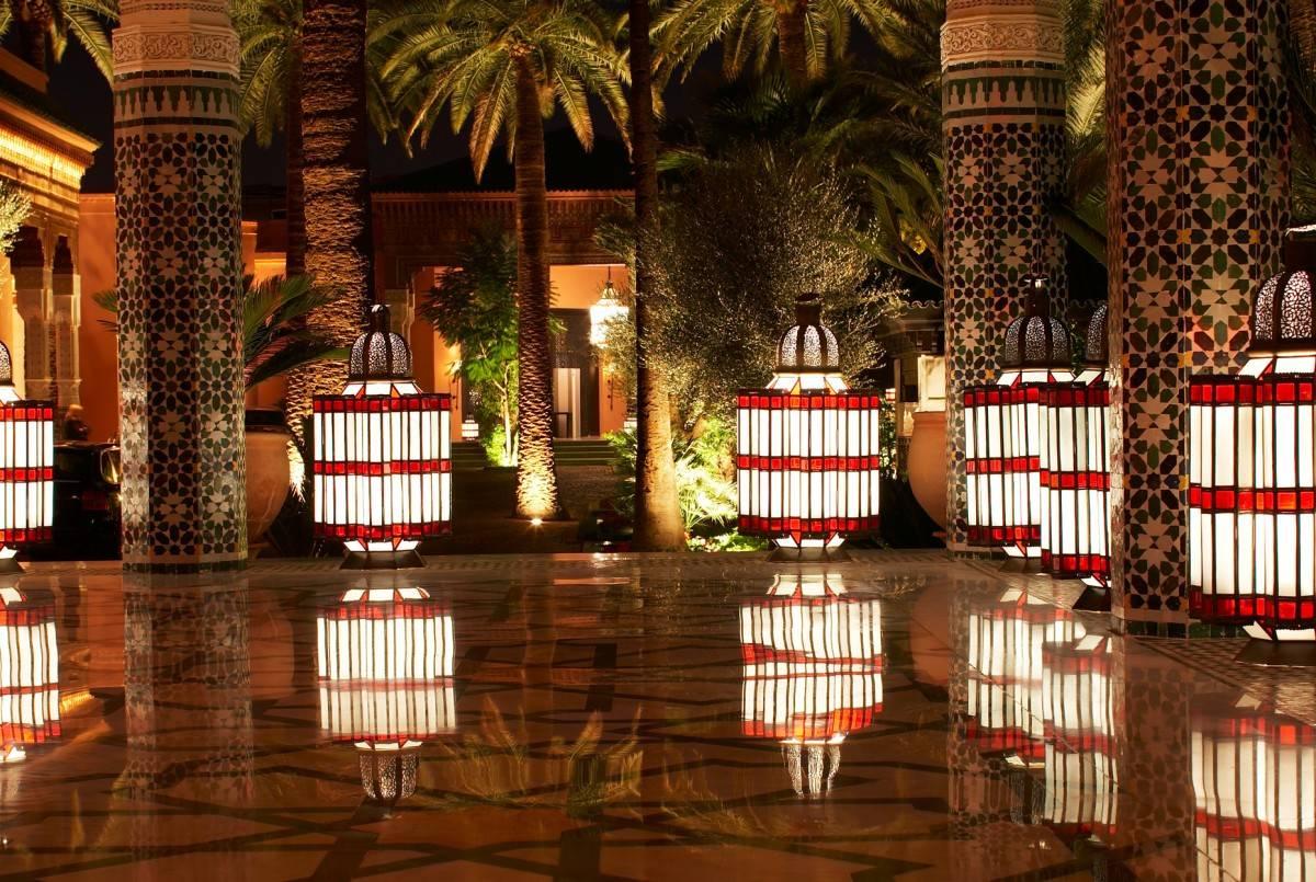 Moroccan handmade metal lantern, as seen at the famous Mamounia Hotel in Marrakech. Large size frosty white and red glass panels on a copper stained frame. This lantern measures approximately 38