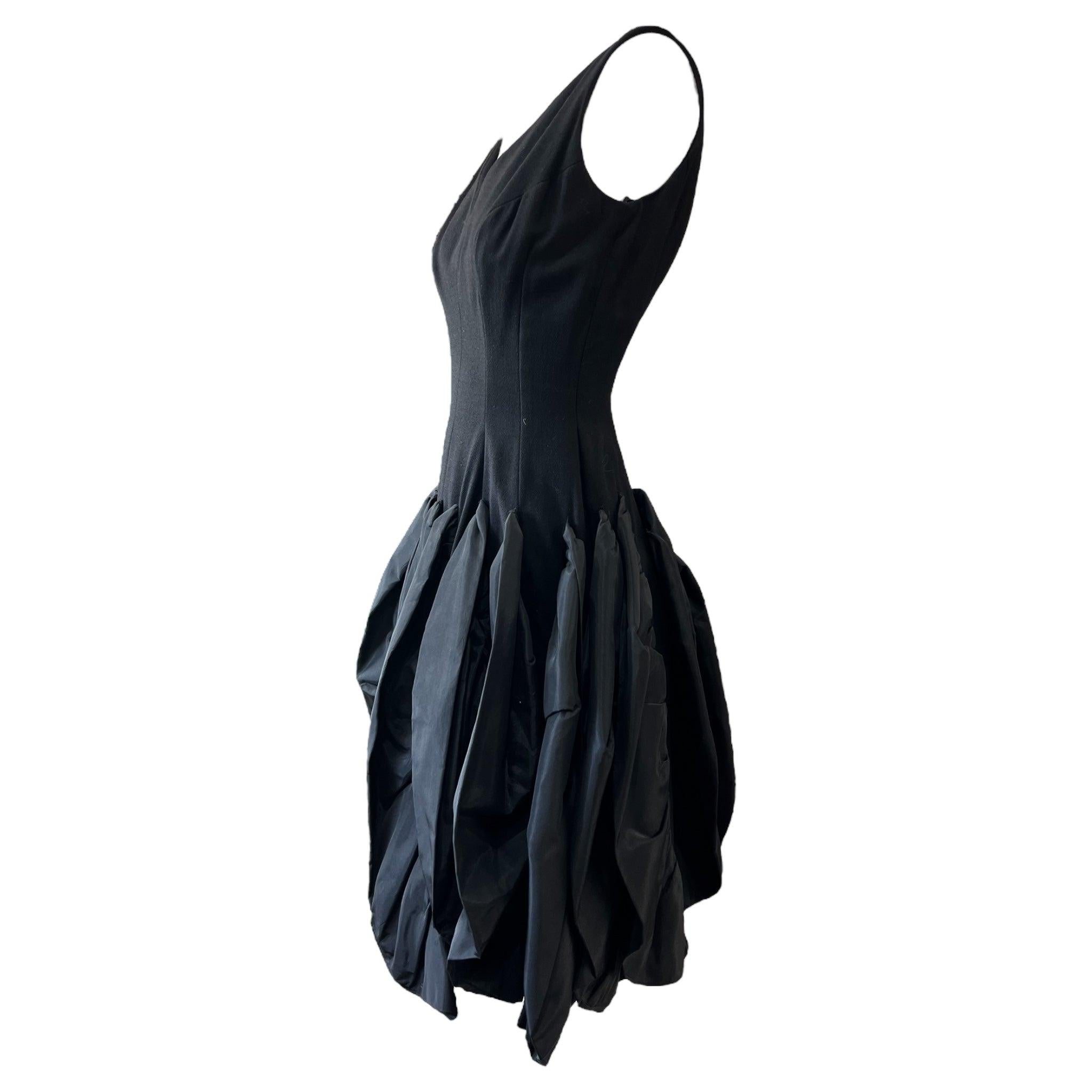 Utterly fabulous unlabeled Betty Carol for Mam'selle 1959/1960 taffeta and wool dress. Sculptural and seamlessly of-it's-time yet light years ahead. This dress was featured in the September 1960 issue of Vogue, and the scan is included below.