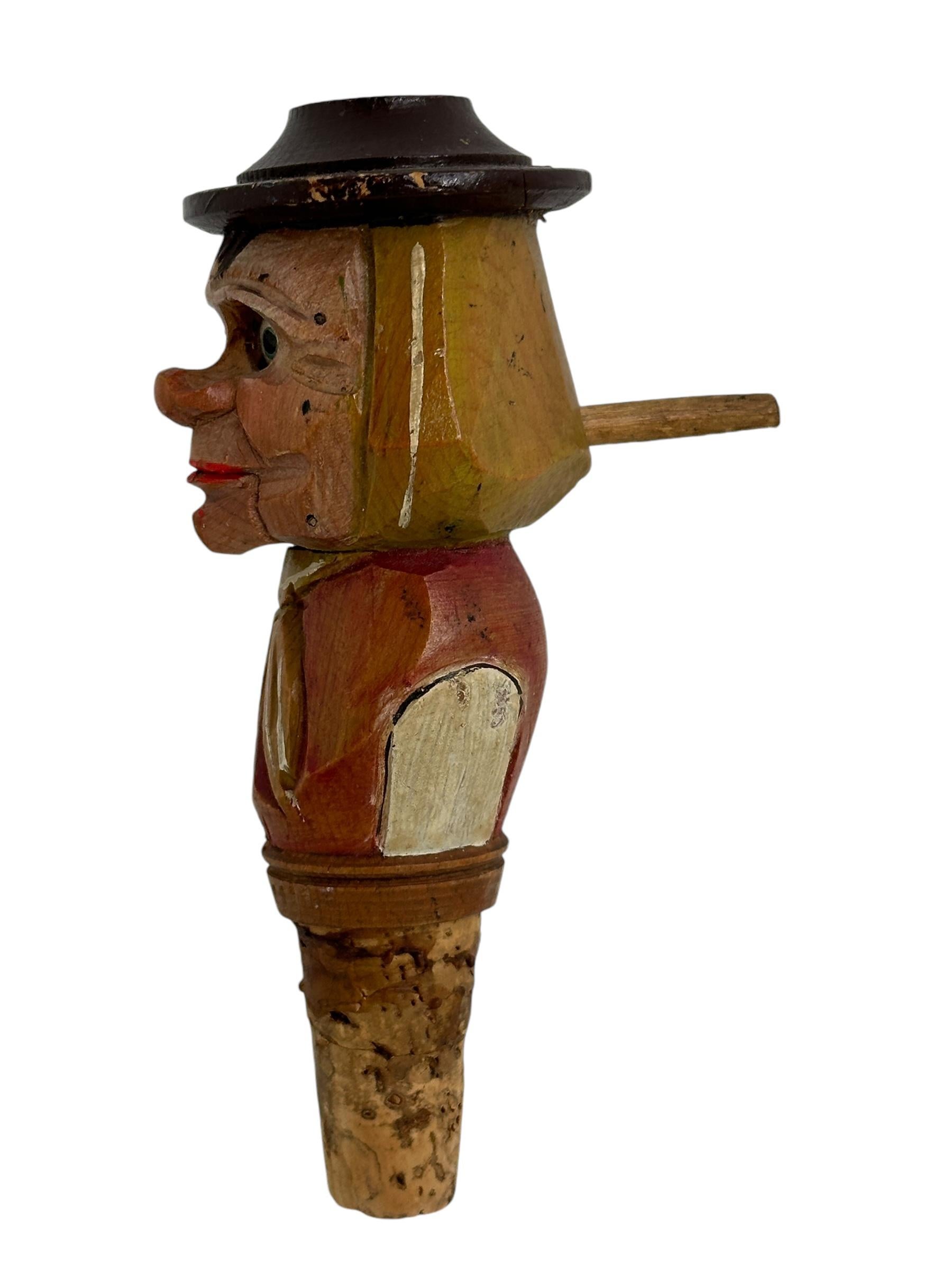 Vintage Stopper Hand Carved Wood Folk Art  - I believe these are ANRI, made in Italy or Austria, but I see no markings, so I'll let the collectors out there be the judge. It depicts a lovely Man from the 1930s. If you push the stick into the back of