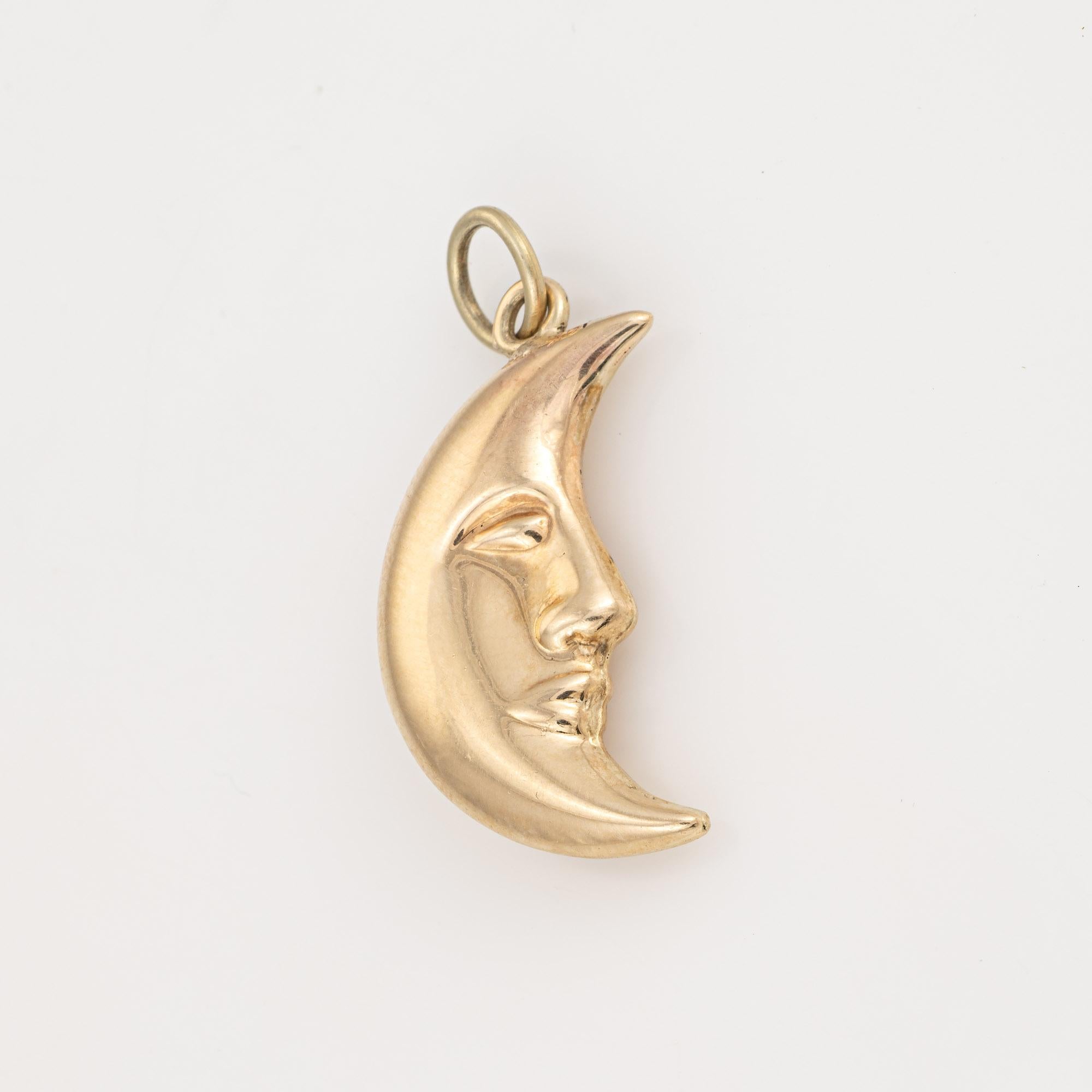 Finely detailed Man in the Moon charm crafted in 18k yellow gold.  

The nicely detailed charm is rendered in lifelike detail with the image of the Man in the Moon appearing on both sides. The hollow charm has a lightweight feel to the touch at 1.6
