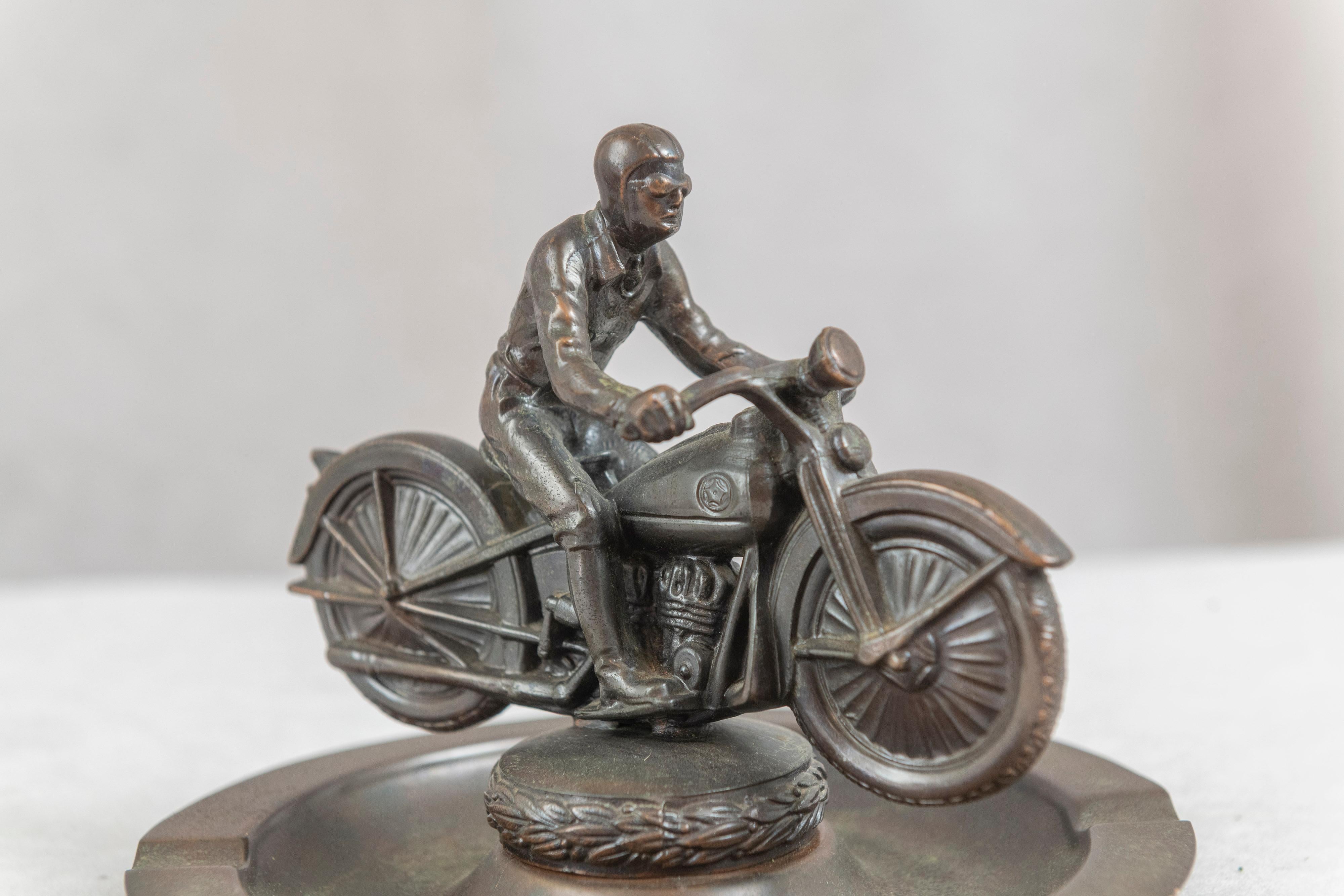   For those who loves motorcycles, here is a little gem. Beautifully cast and finished in a warm dark brown with hints of copper showing through, not quite what is referred to as 