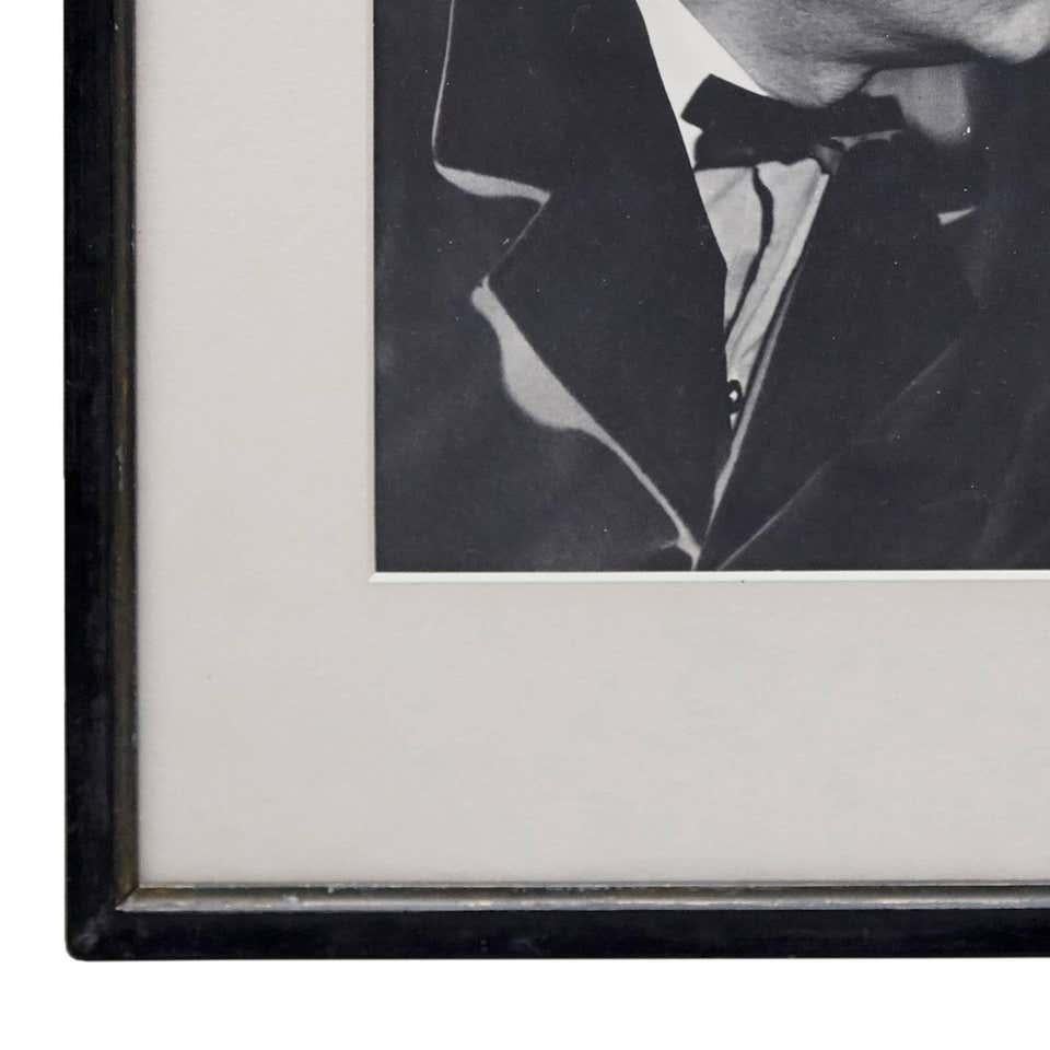 Man Ray Photograph of Georges Braque, 1930.

A posthumous print from the original negative in 1977 by Pierre Gassmann.

Gelatin silver bromide, framed on a 19th century frame with museum glass.

(Man Ray 1890–1976) was an American visual