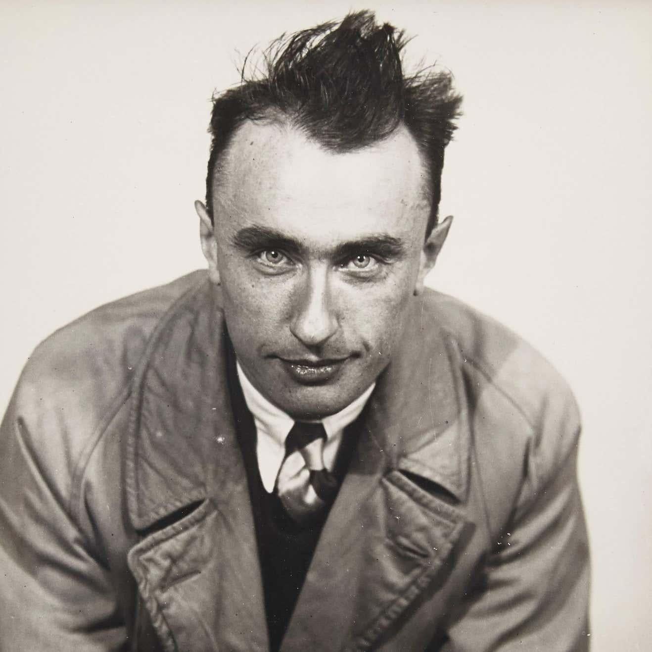 Portrait of Yves Tanguy photographed by Man Ray, circa 1930.

A posthumous print from the original negative in 1977 by Pierre Gassmann.

Gelatin silver bromide.

Born (Philadelphia, 1890-Paris, 1976) Emmanuel Radnitzky, Man Ray adopted his