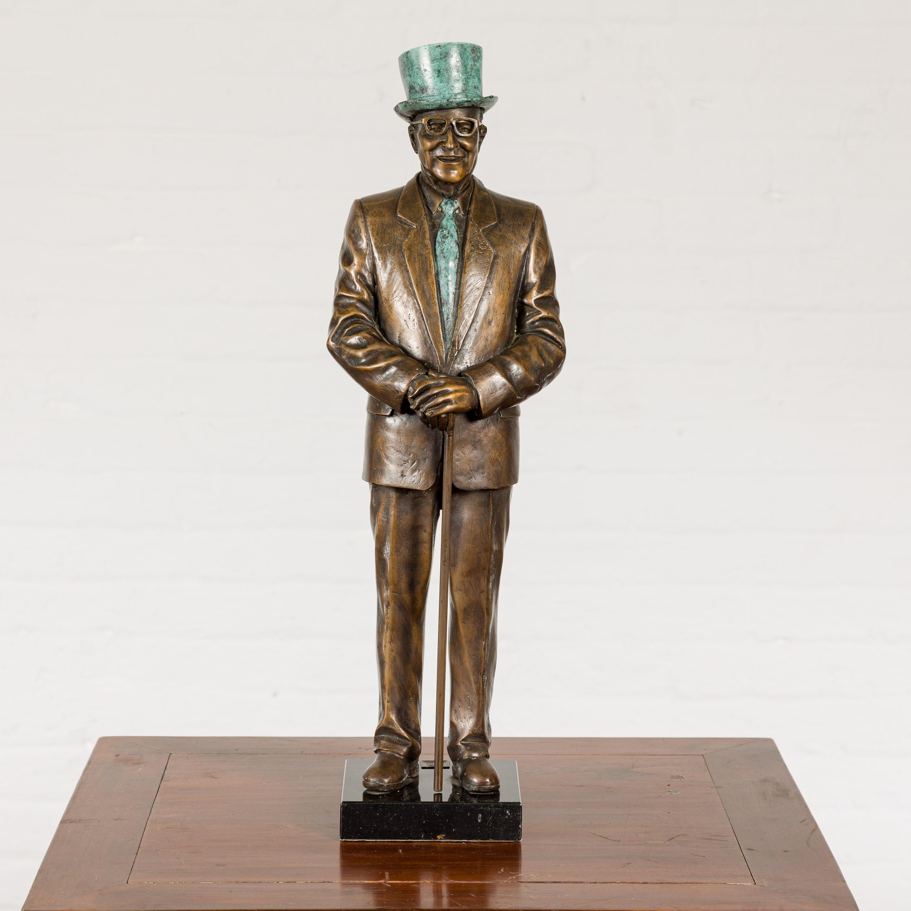 20th Century Man Wearing Top Hat Bronze Tabletop Statuette with Gold and Verdigris Patina For Sale