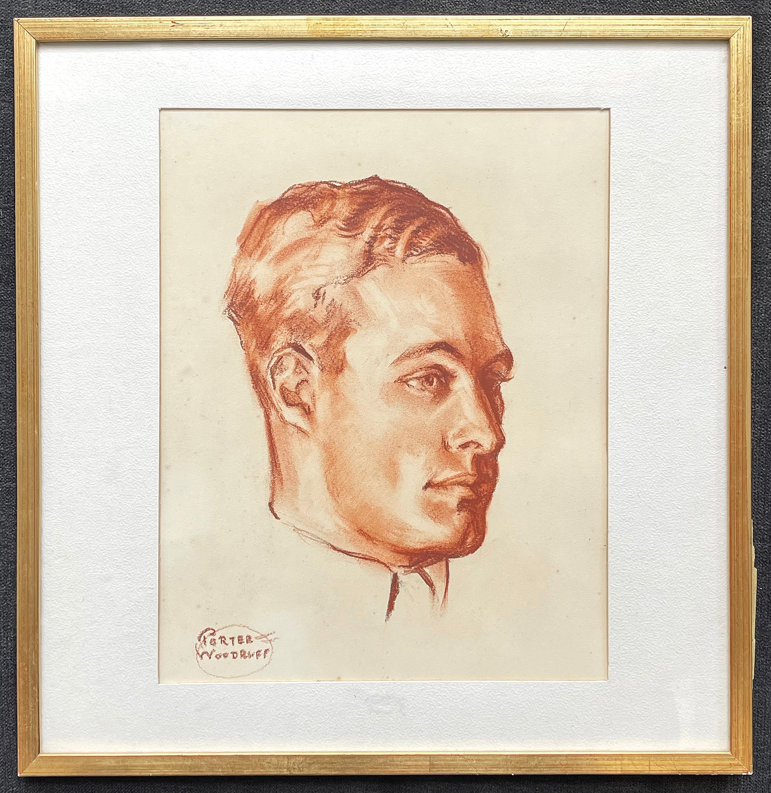 Dieses Porträt eines gut aussehenden jungen Mannes mit gespaltenem Kinn, gewelltem Haar und festem Blick wurde von Porter Woodruff in den 1930er Jahren in Pastell und Rötel auf blassgelbem Papier gezeichnet. Der Künstler ist vor allem für seine