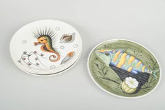 Mancioli, Italy. Five hand-decorated faience plates with colourful motifs. 1960s